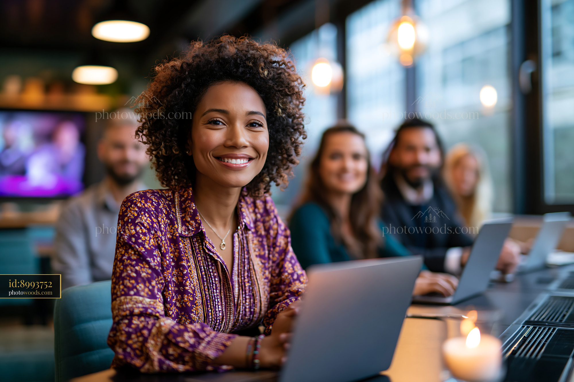 Diverse Hybrid Team Working Together in a Modern Office Setting