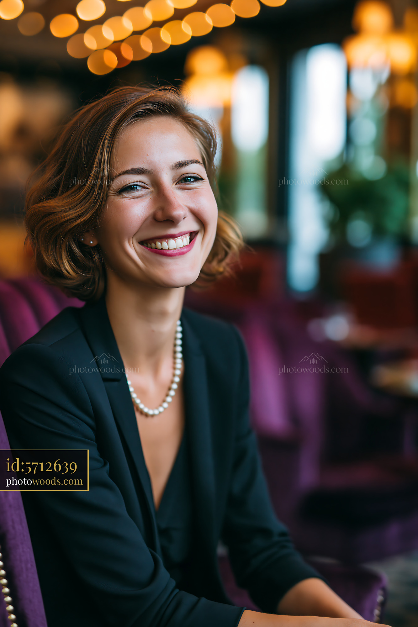 Woman Smiling in a Stylish Setting With Bright Lights