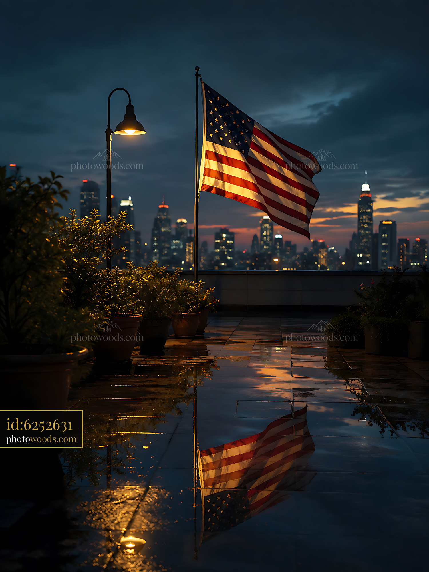 US Flag Waves on Rooftop With City Skyline at Night