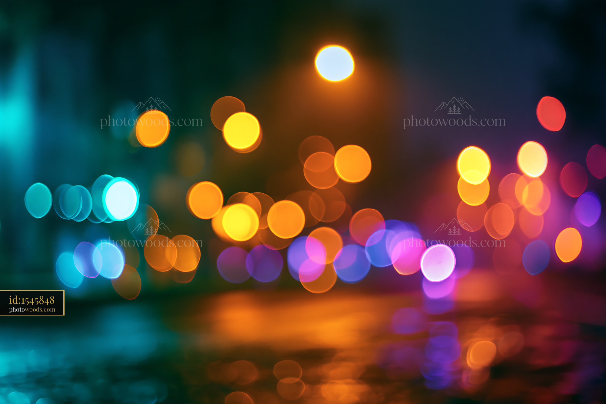 Bokeh Lights Create Colorful Reflections on a Wet Street at Night
