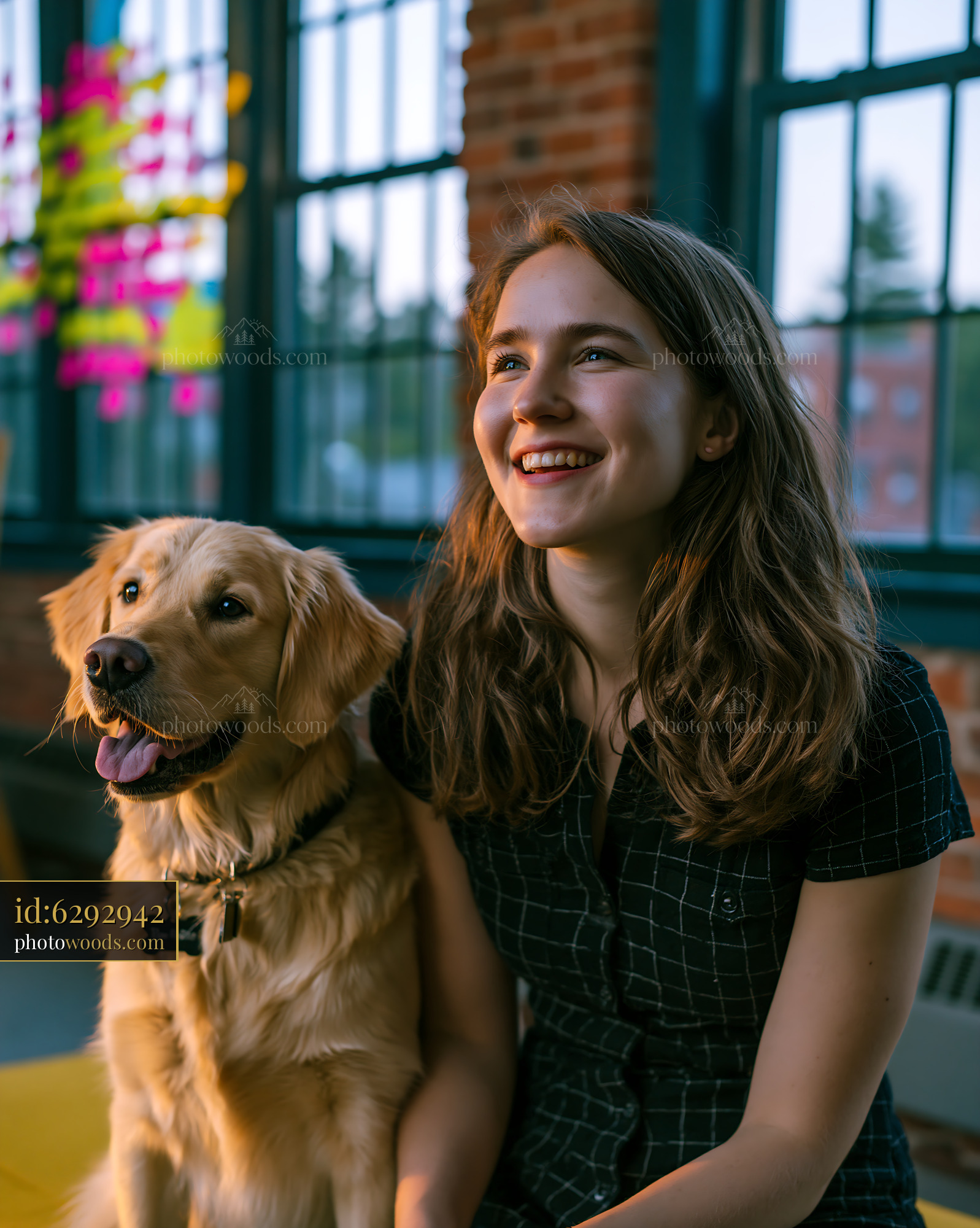 Cheerful Young Woman With Golden Retriever Dog Indoors