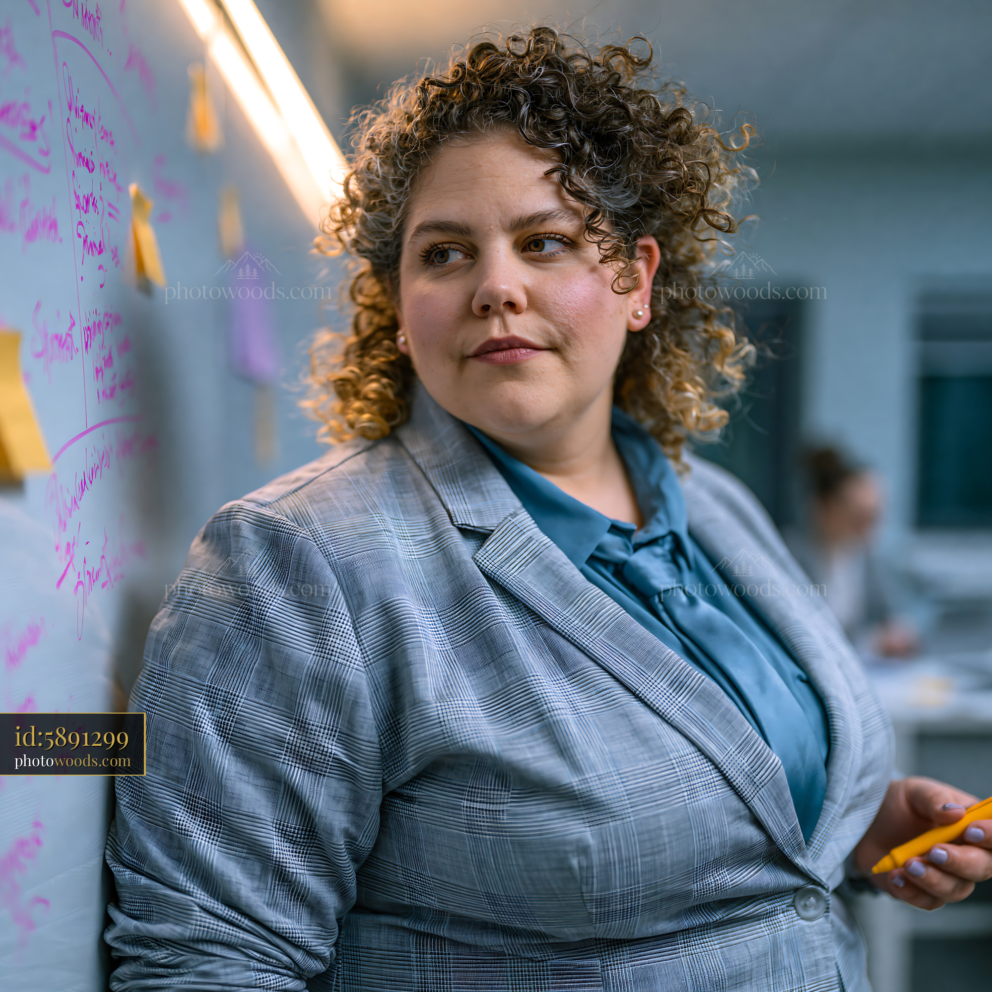 Plus Size Businesswoman in Tailored Suit in Office Setting