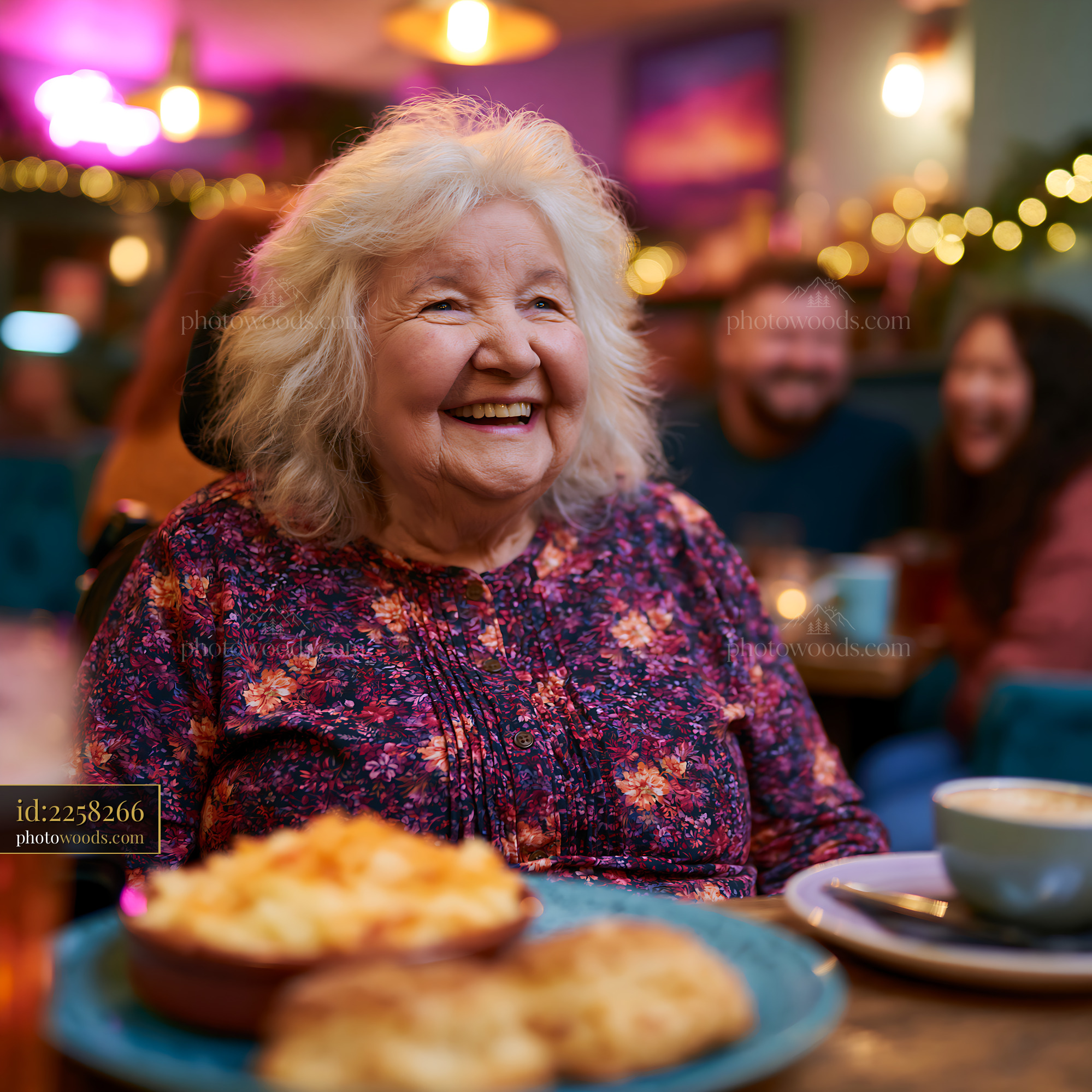 Laughing Grandmother Enjoying Food in a Cafe Setting