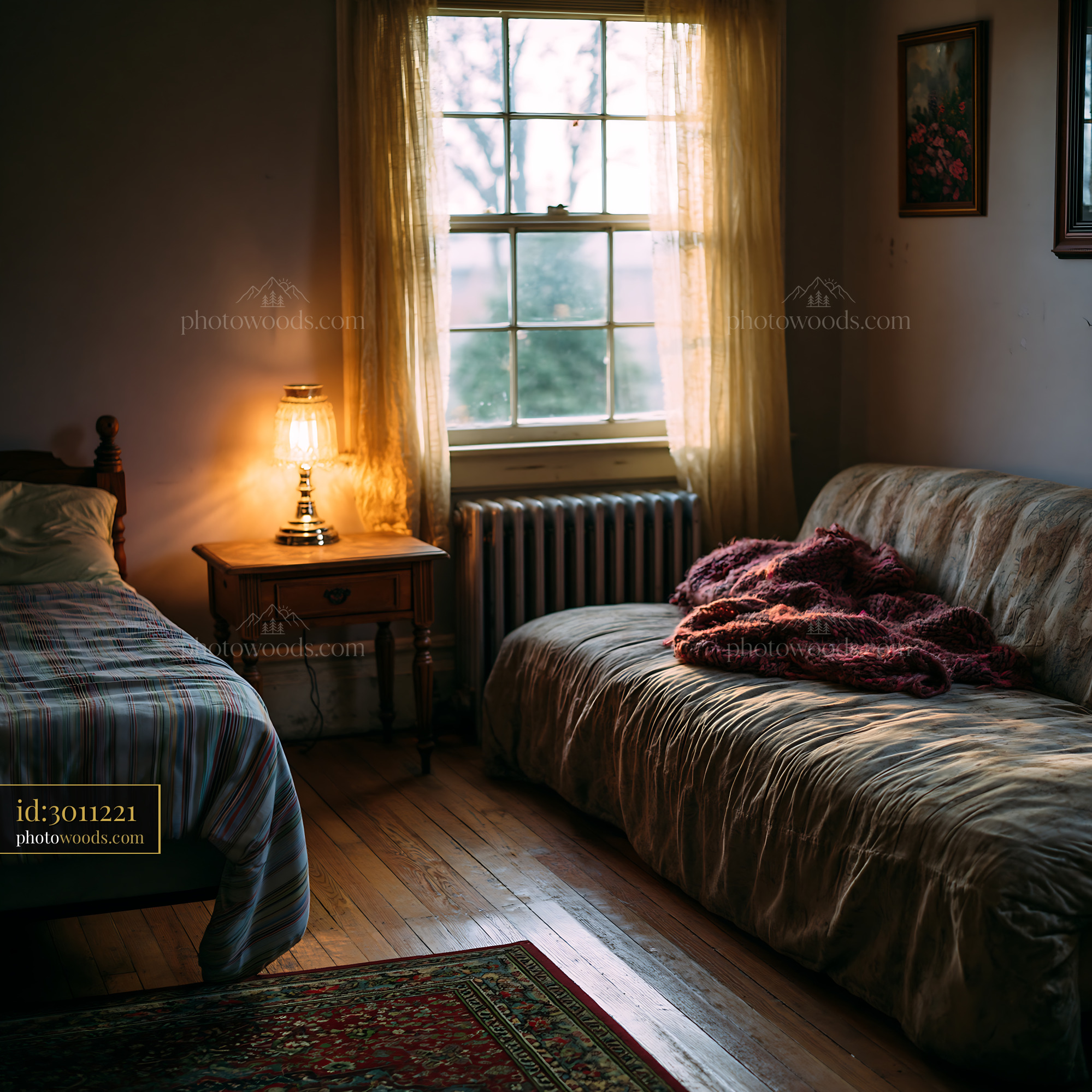 Sparse Room With a Single Bed and a Soft Couch by the Window