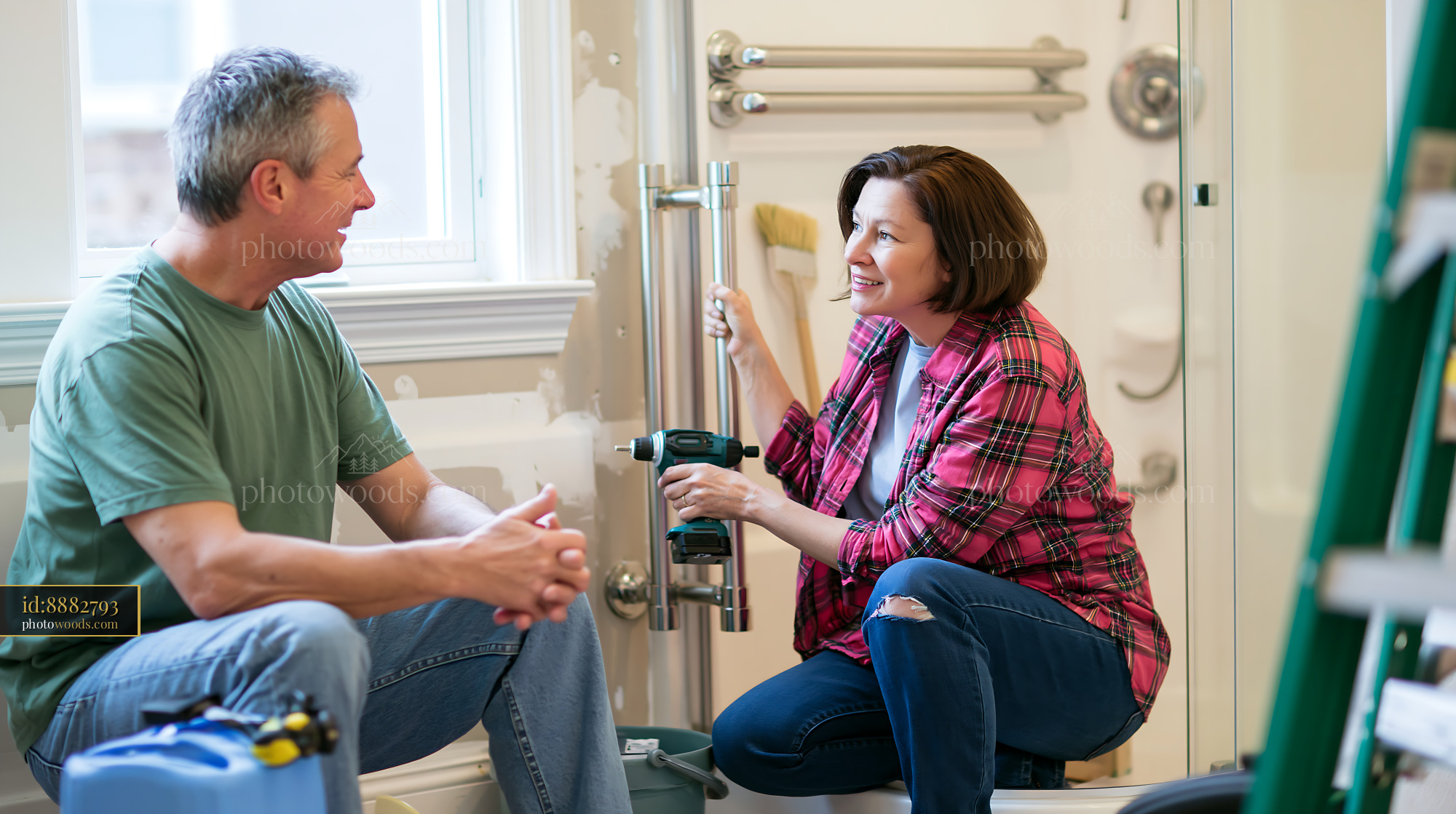 Couple Discussing Home Renovation Plans in Bathroom Setting