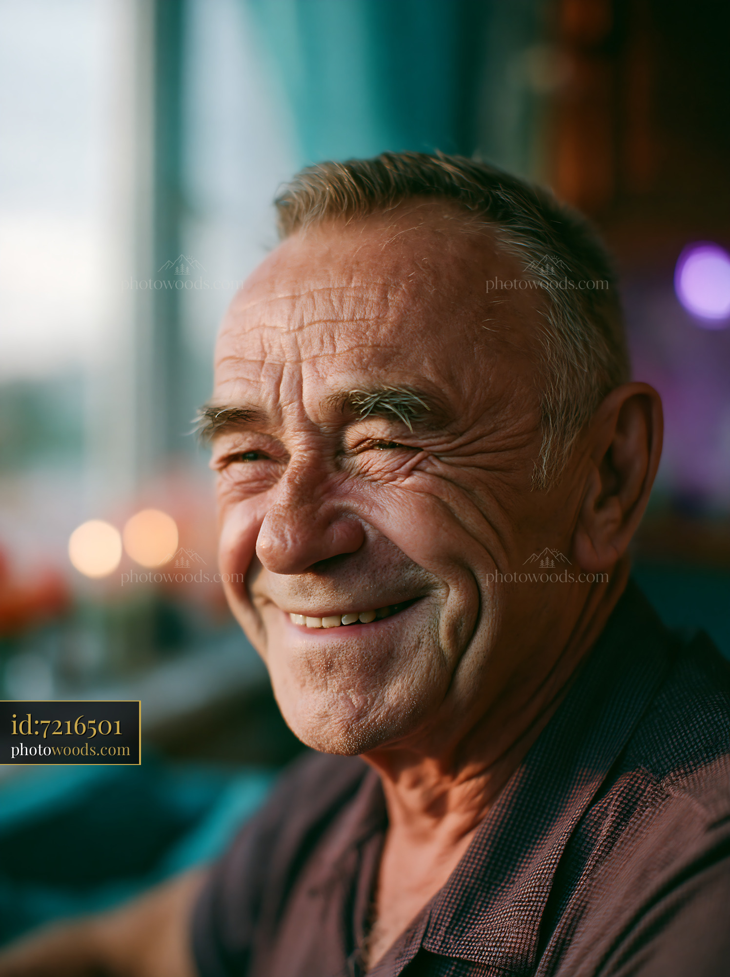 Elderly Man Smiles Warmly Near Indoor Window With Soft Light