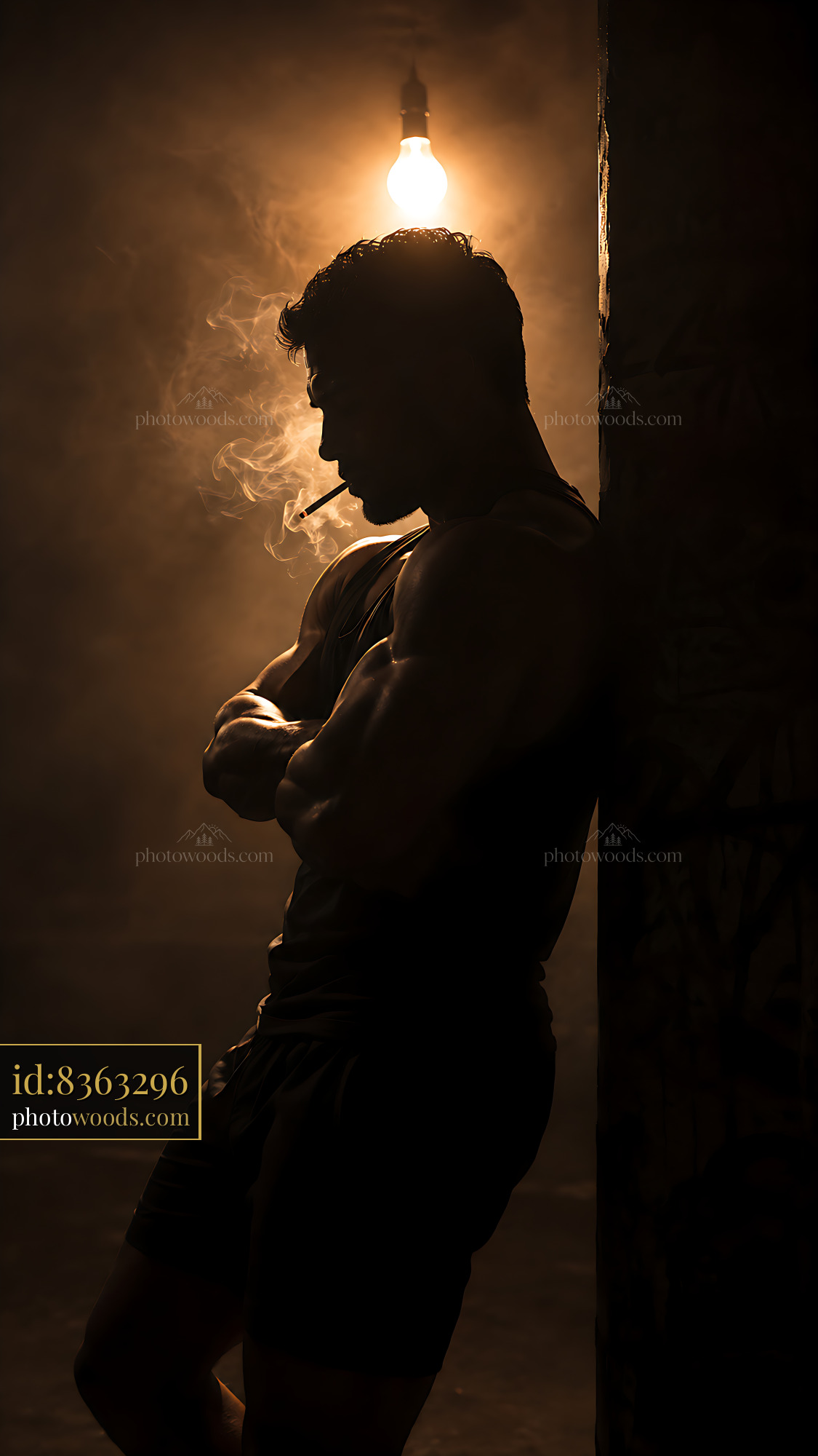 Silhouette of a Man Smoking Near a Light Source