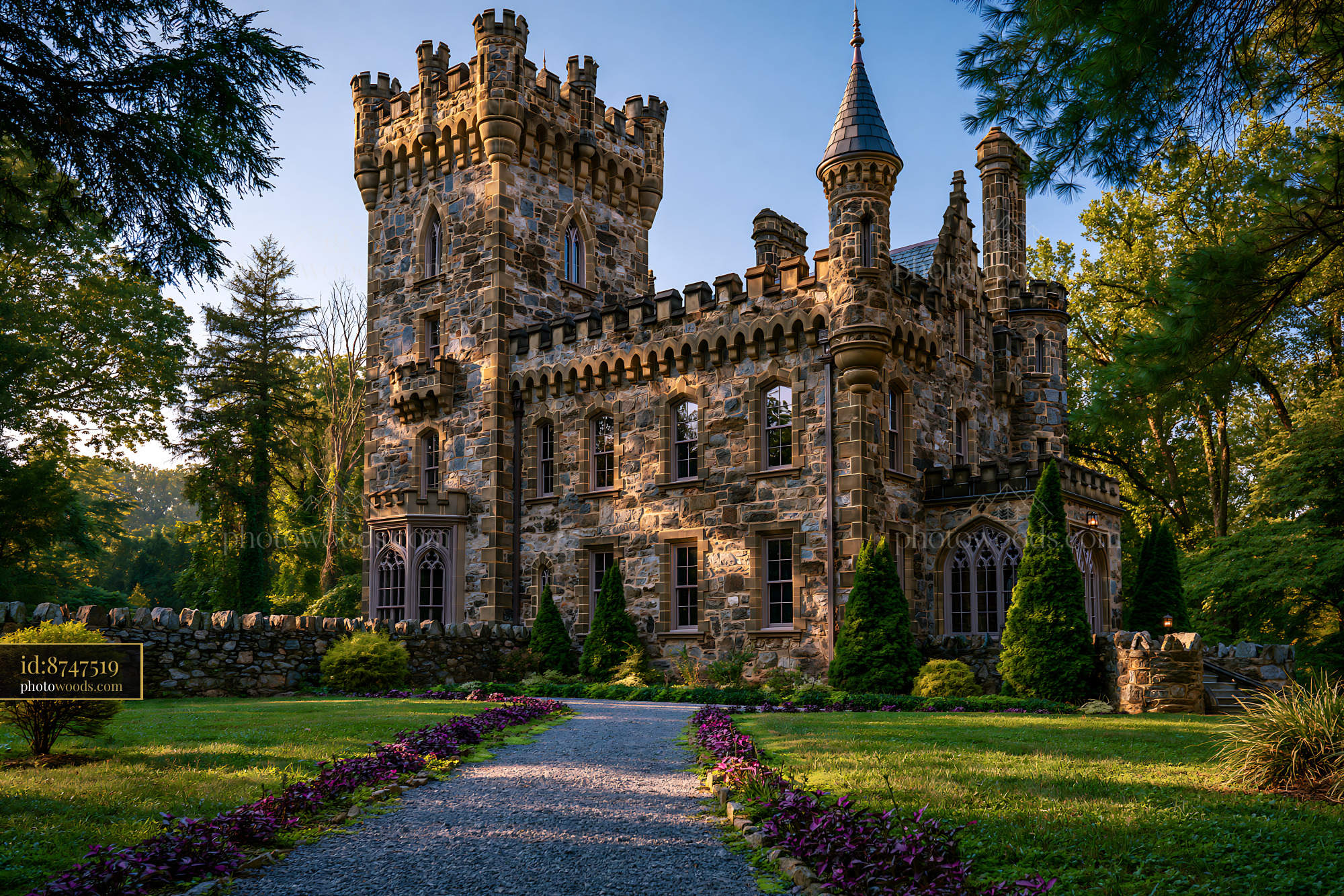 Historic Castle in Summer Garden Setting With Trees and Pathway