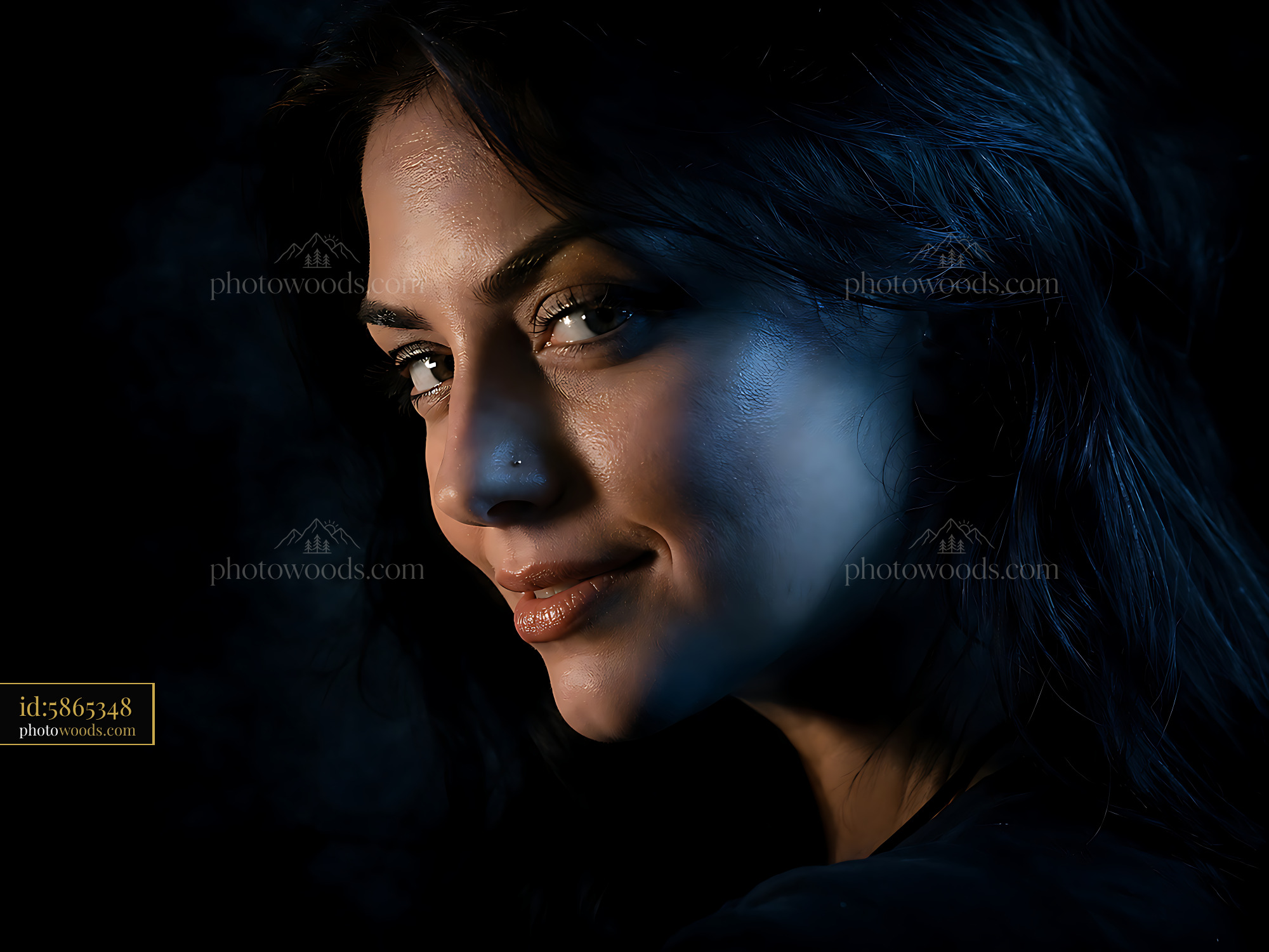Woman With Dark Hair Looking Over Her Shoulder With a Slight Smile