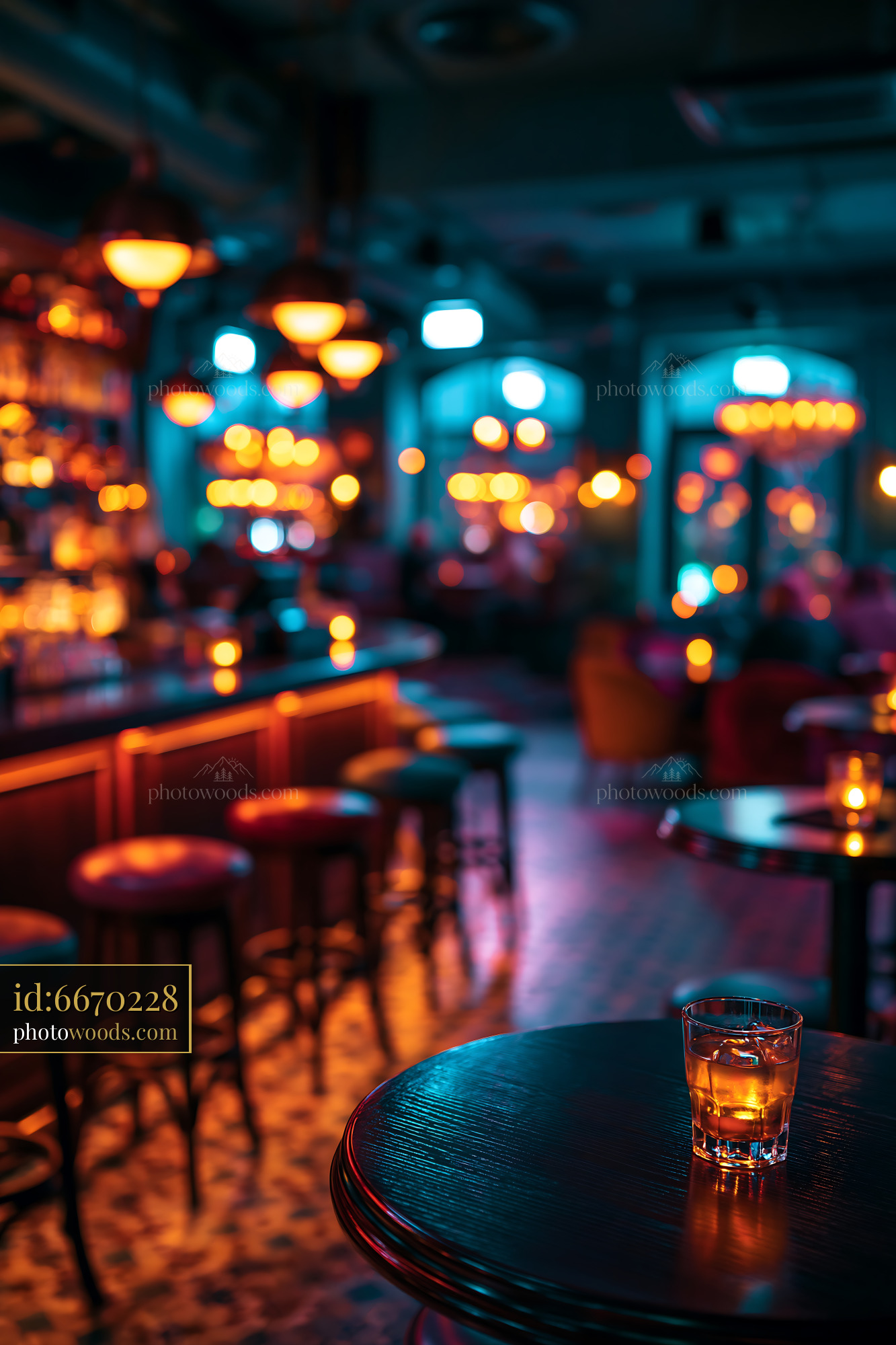 Bar Scene With Cocktail Glass Resting on Table in Low Light