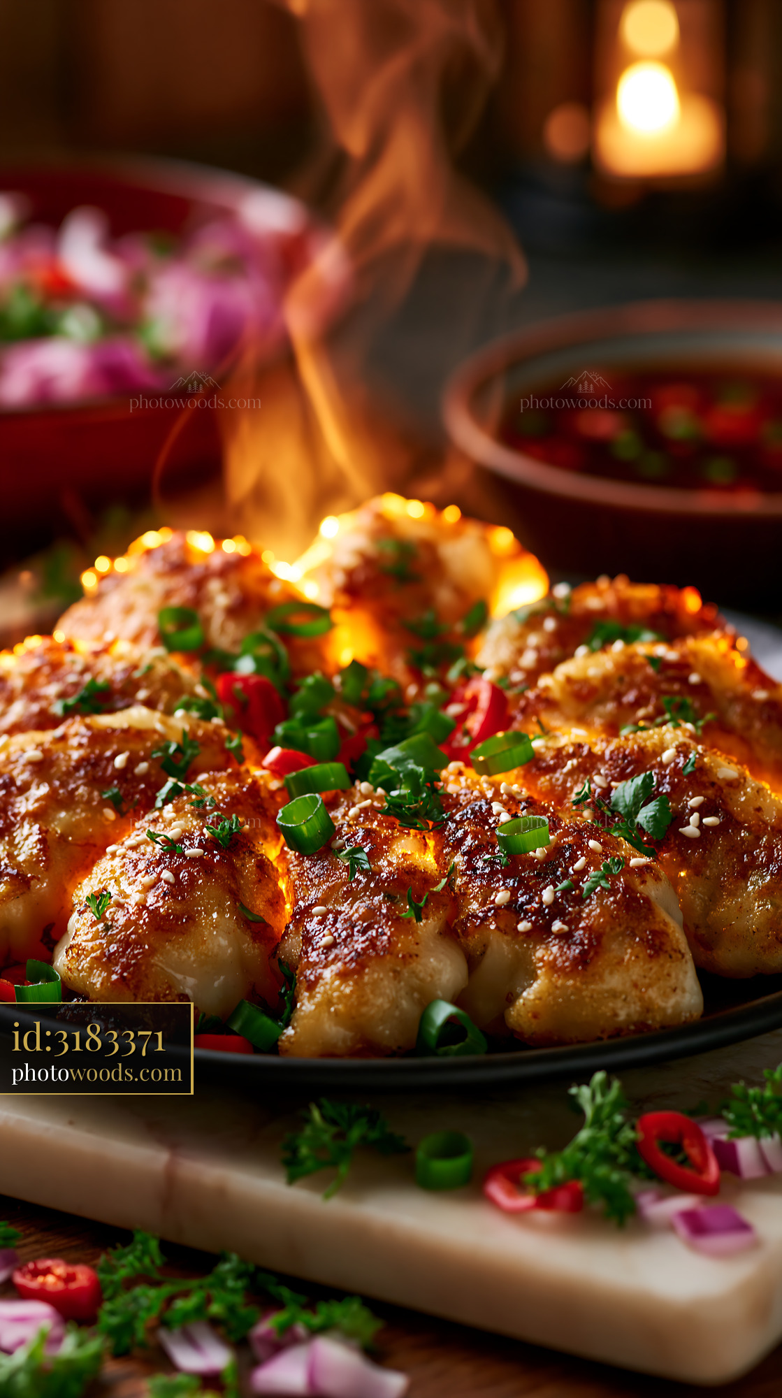 Gyoza With Crispy Edges Served on a Dark Plate With Herbs