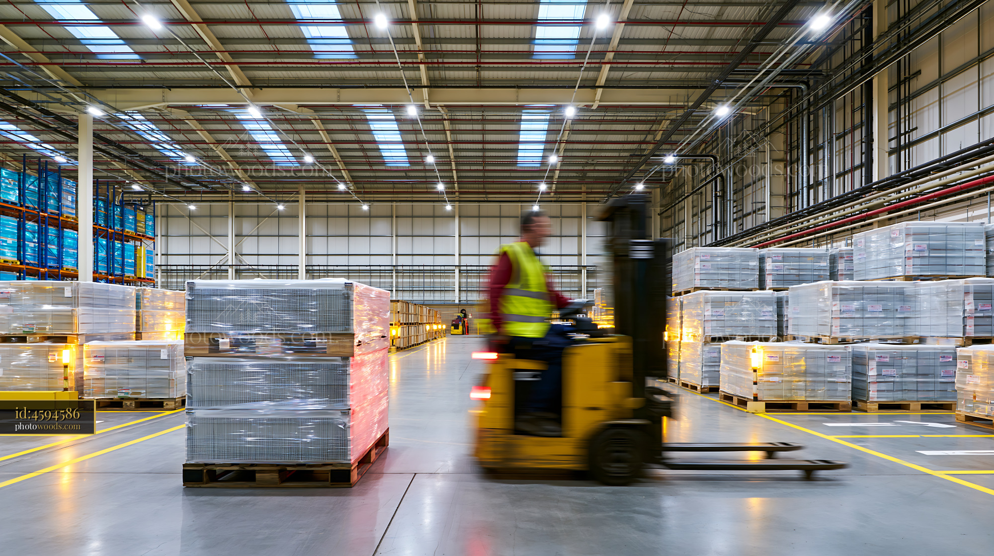 Forklift Operator Moving Pallets in Warehouse Setting During Daytime