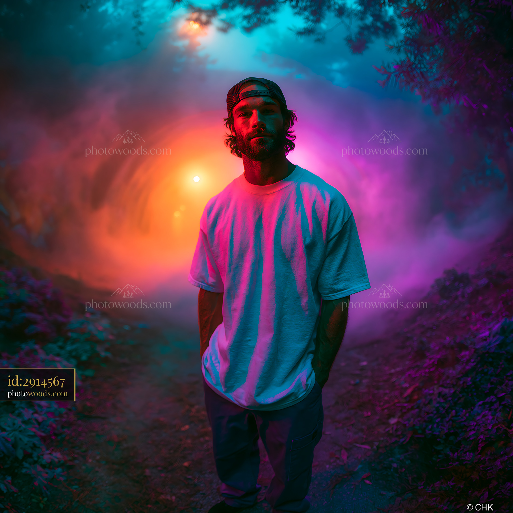 Skater Man Standing in a Colorful Misty Forest Setting