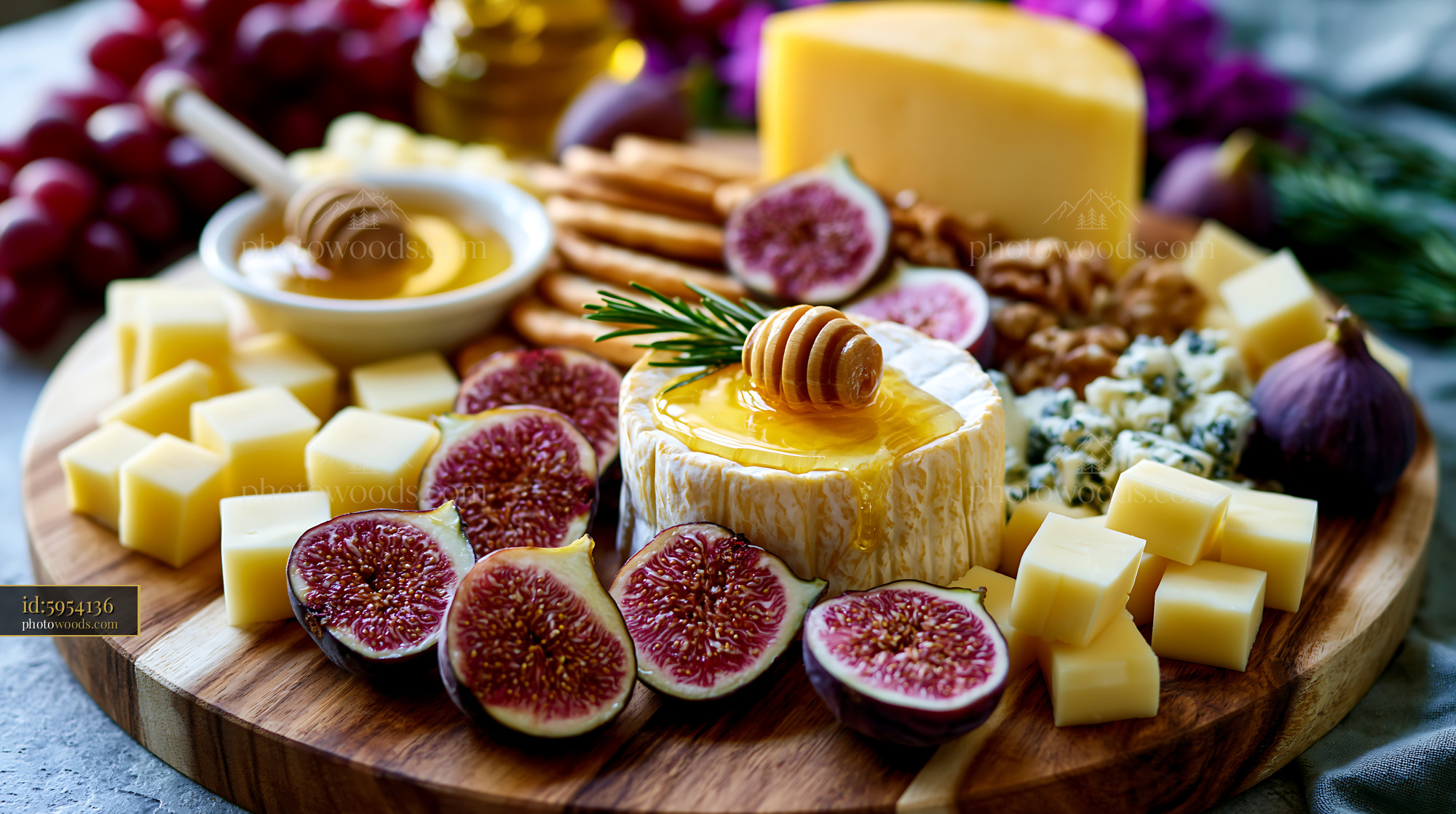 Charcuterie Board With Cheeses Figs Honey and Nuts on a Wooden Platter
