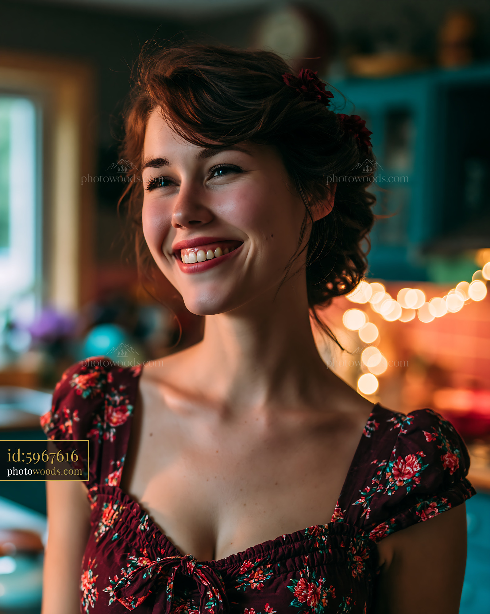 Woman Smiling in a Kitchen With Warm Lights During Evening