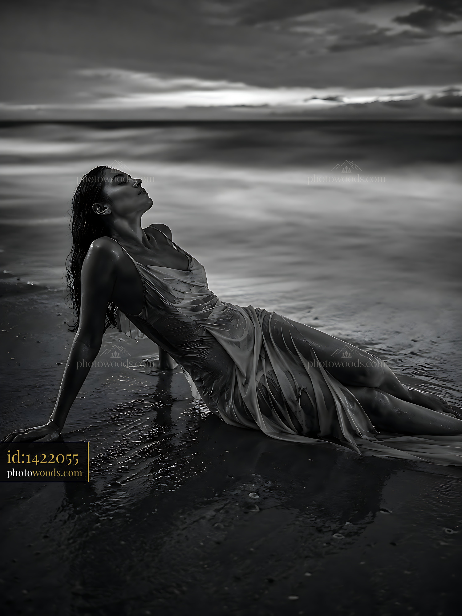 Woman Relaxes in Water at the Beach During Sunset