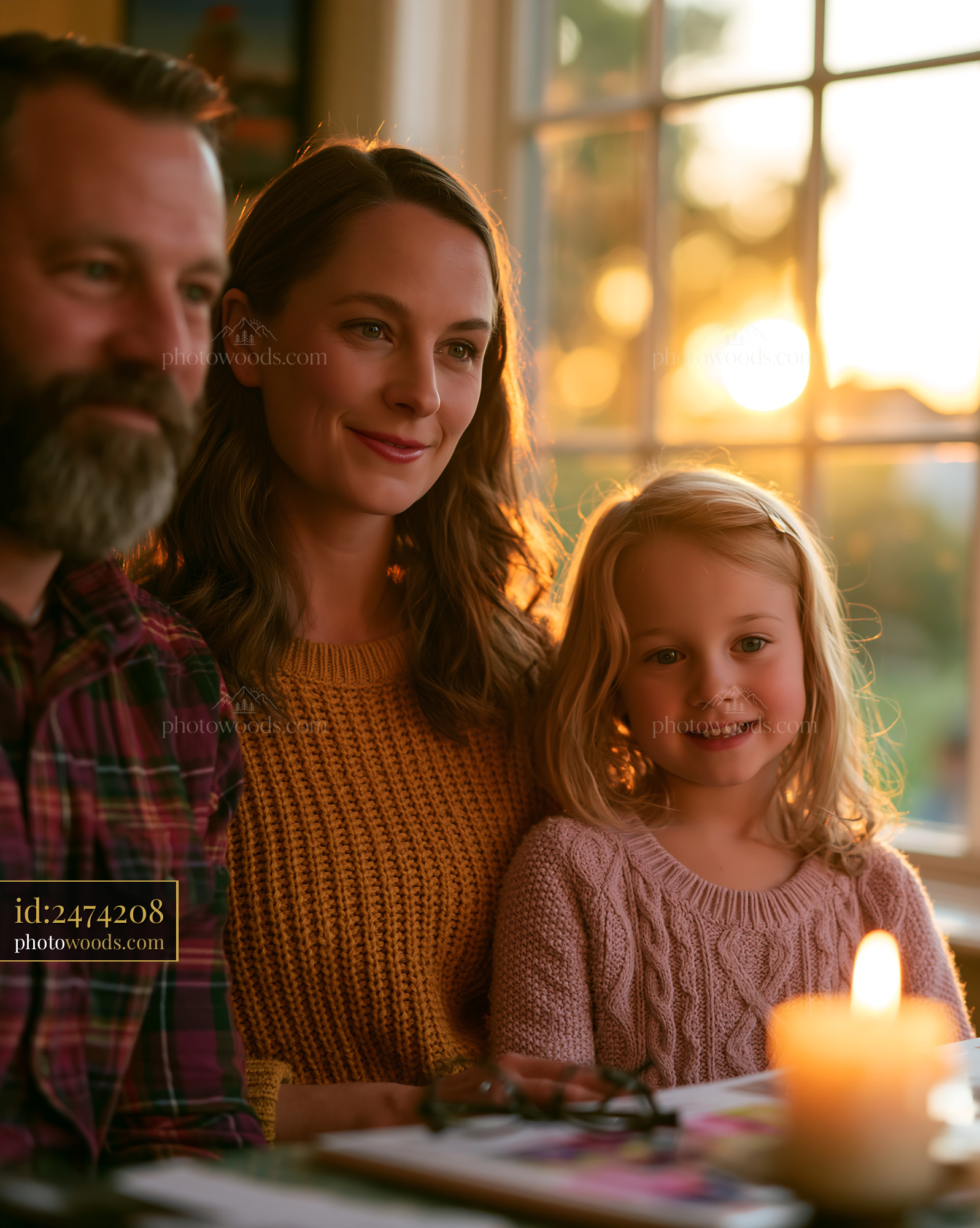 Family Comparing Insurance Offers at Sunset With Candlelight