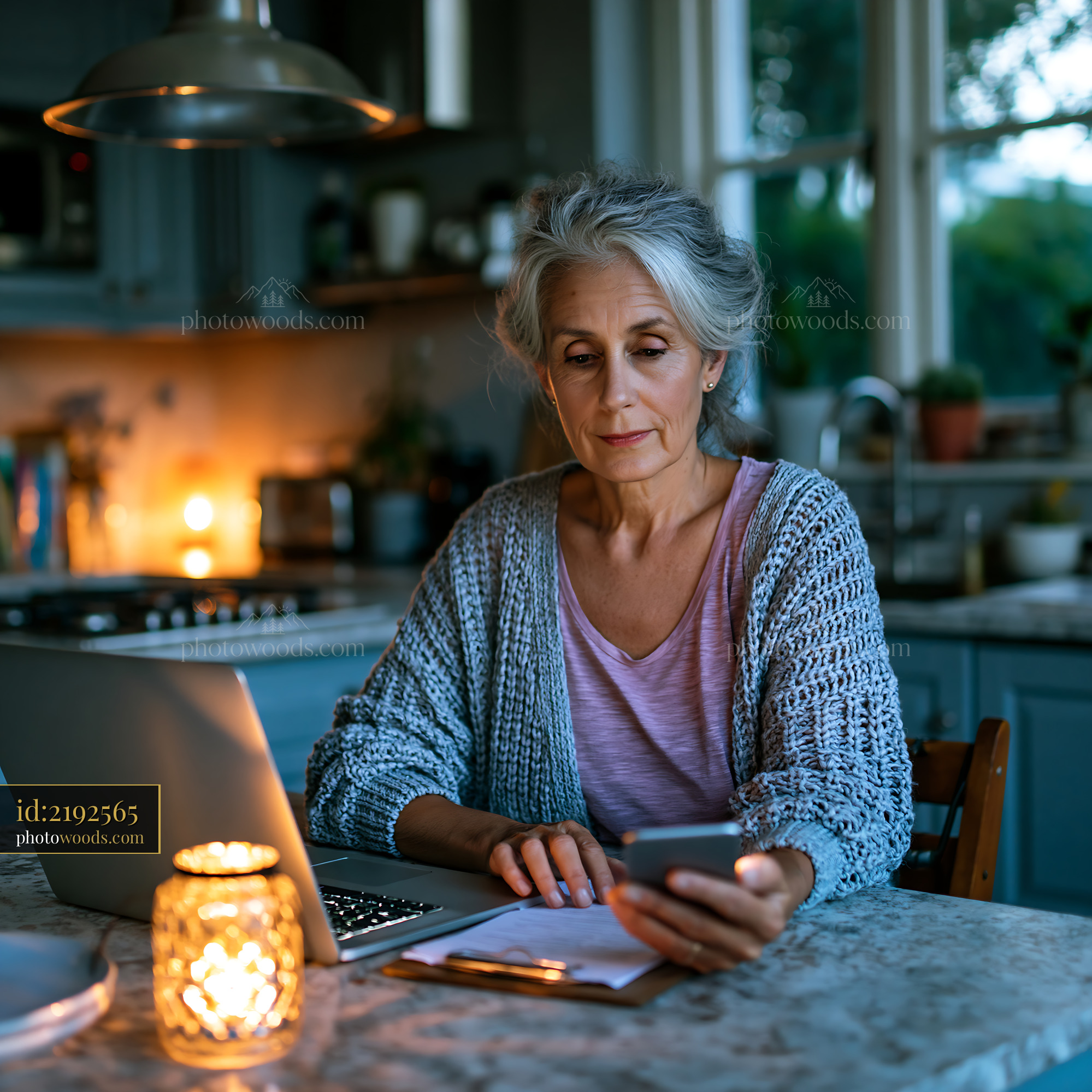 Senior Woman Managing Digital Estate Documents in Cozy Kitchen