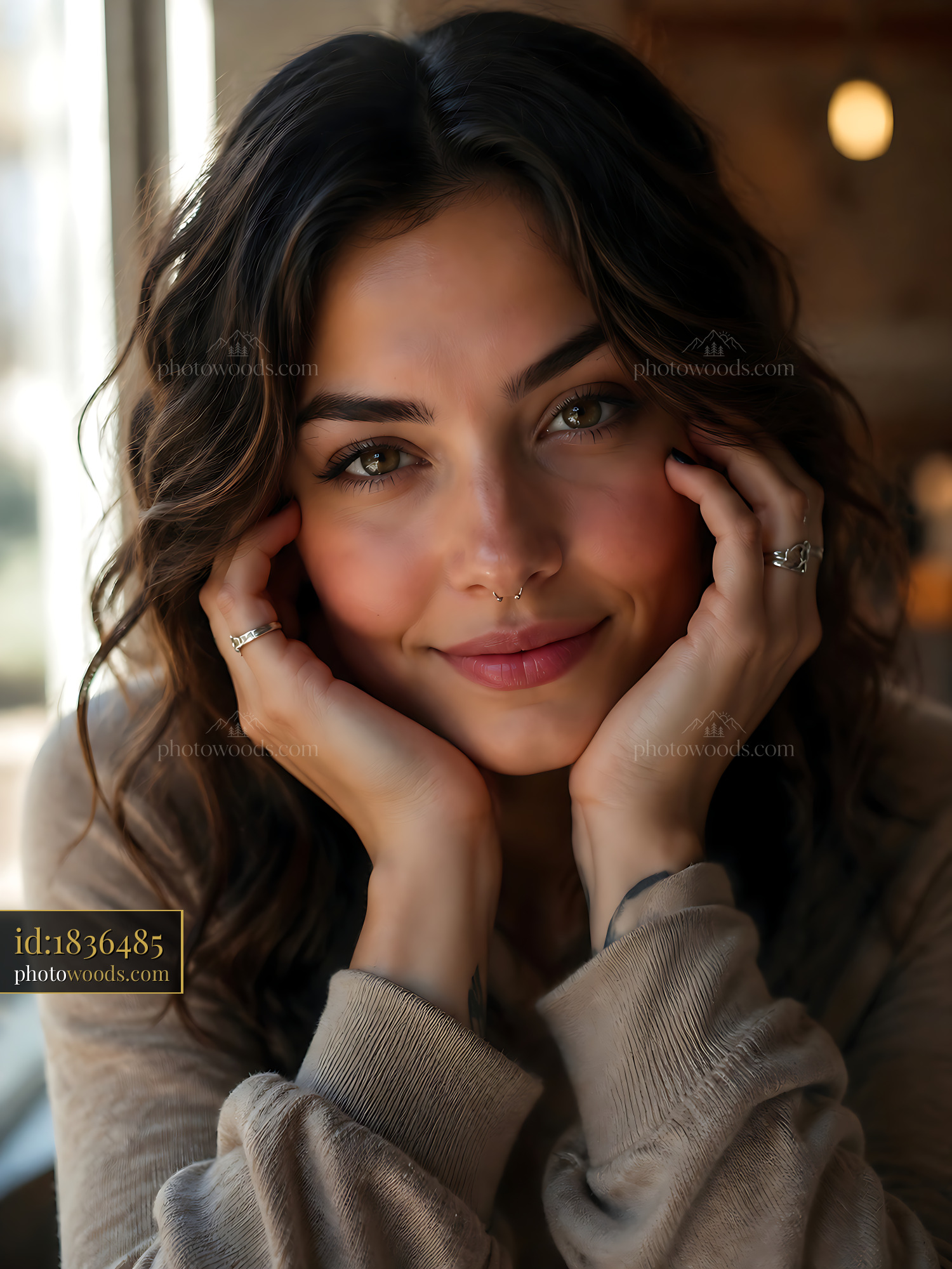 Woman With Curly Hair Sitting at a Cafe With Warm Light