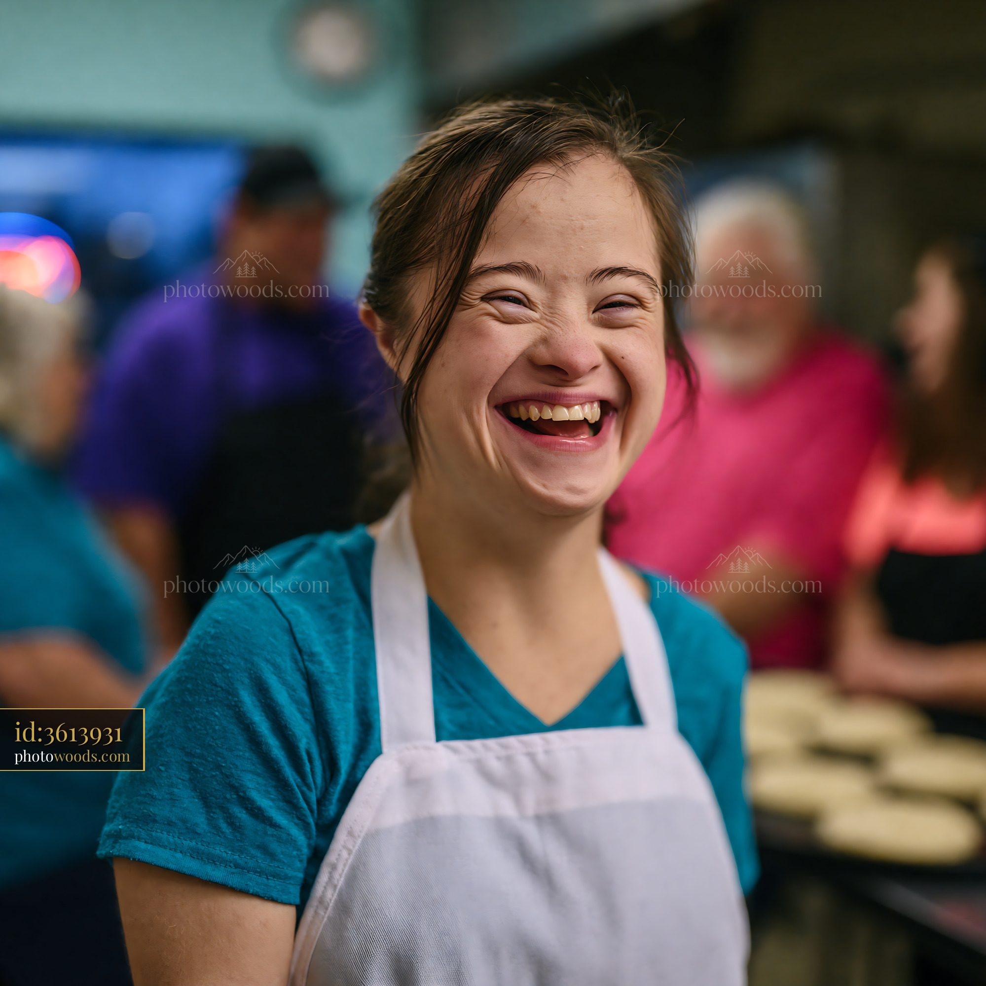 Young Woman With Down Syndrome Smiling as Bakery Employee