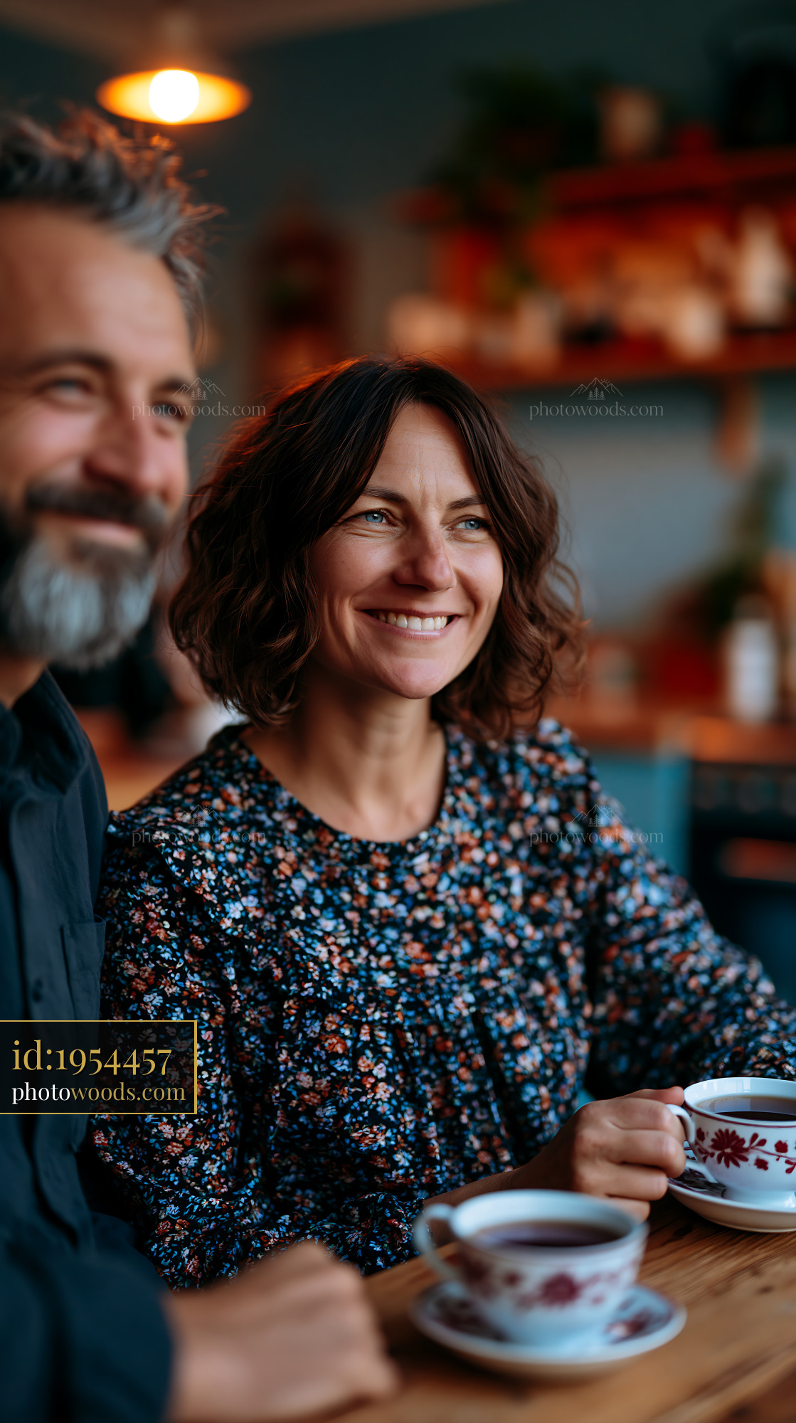 Couple Enjoying Coffee at a Cafe in a Cozy Setting