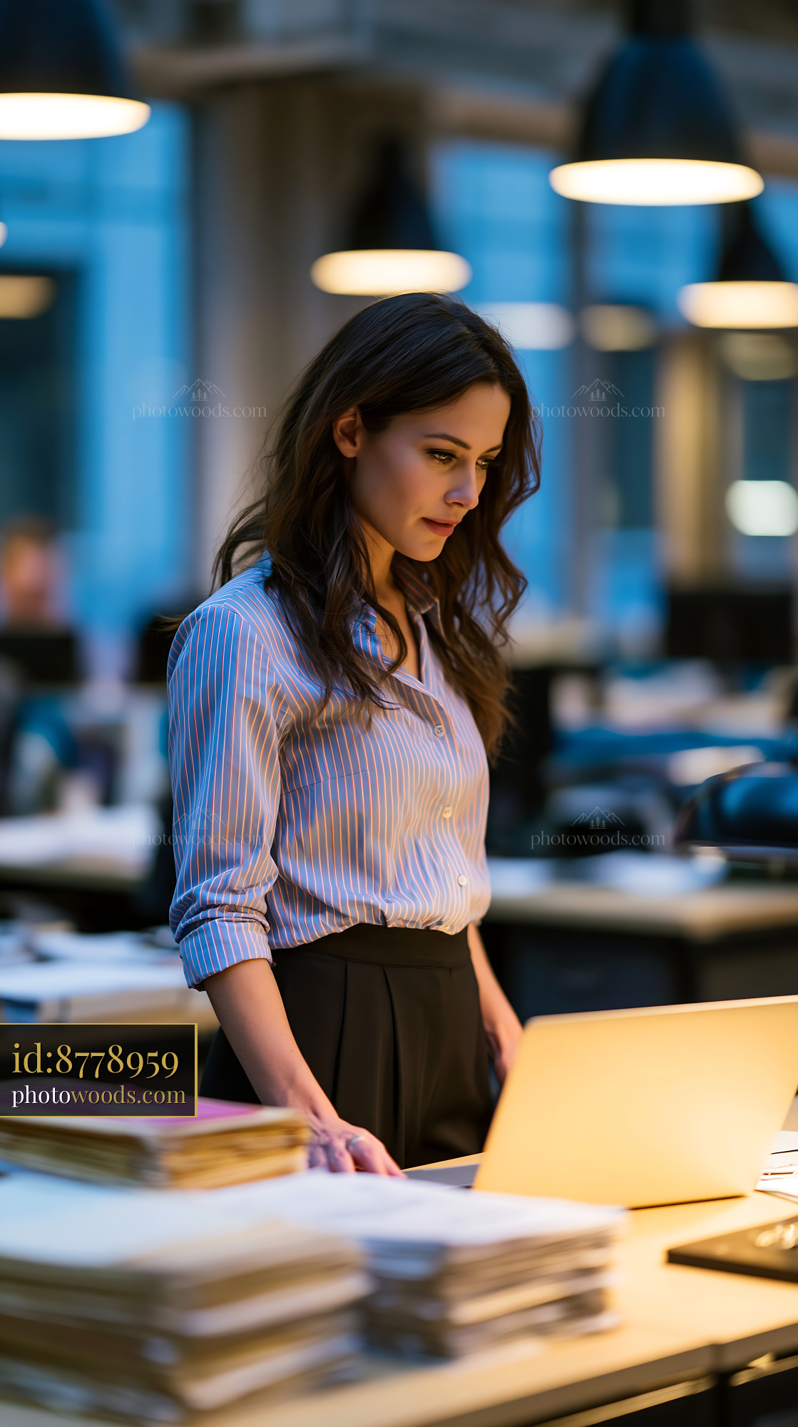 Compliance Officer Reviewing Files in Modern Office Setting