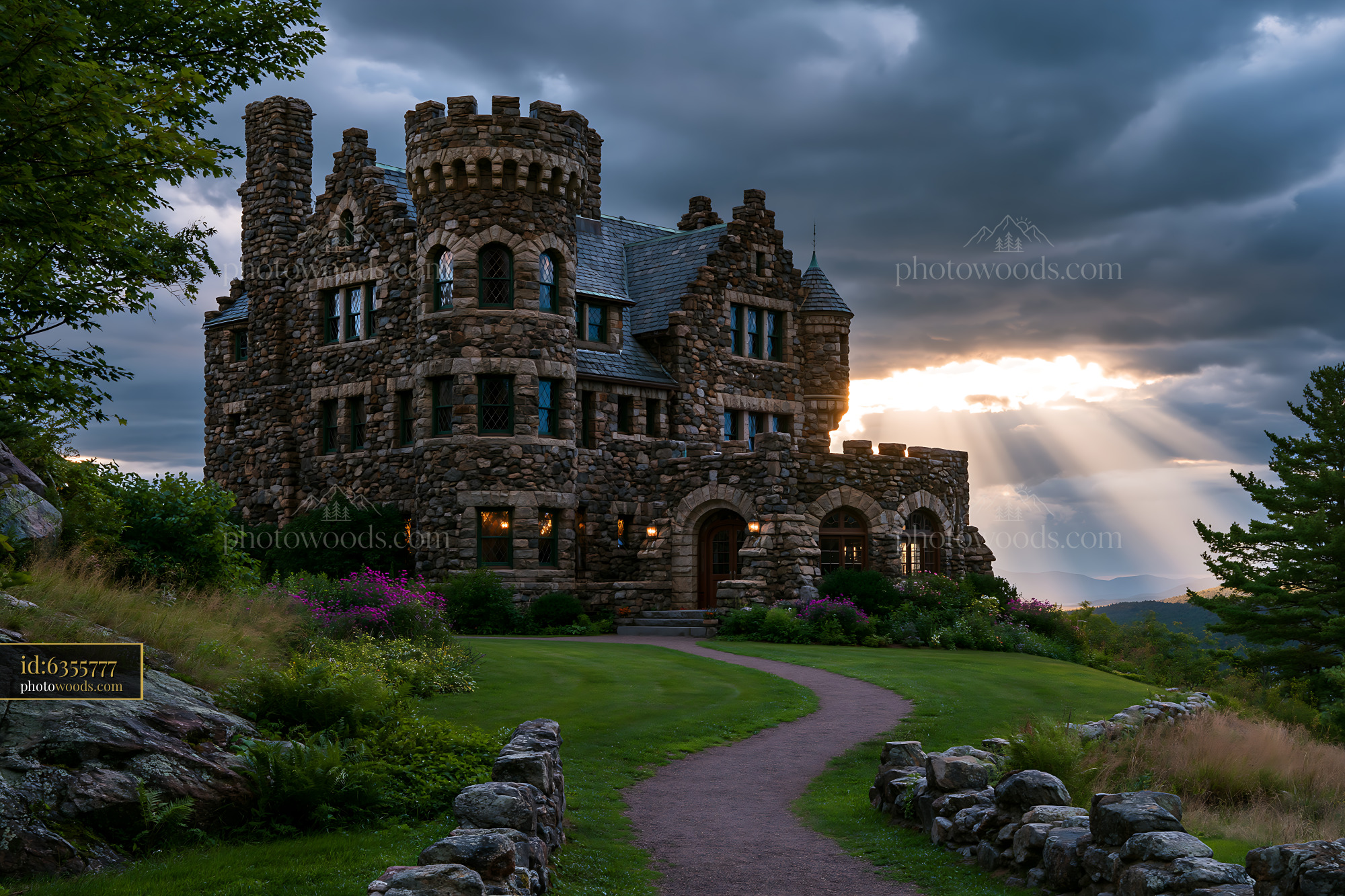 Castl in the Mountains During Golden Hour With Dramatic Clouds