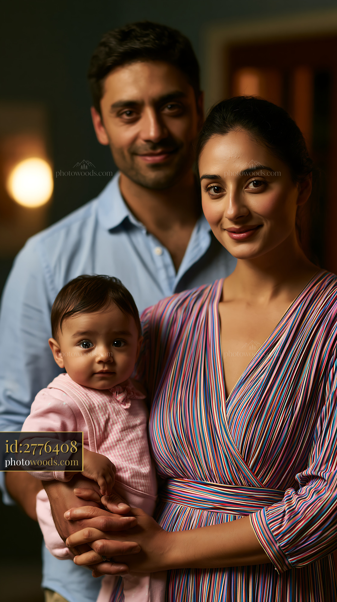 Family Portrait of Parents Holding Their Baby in Evening Light