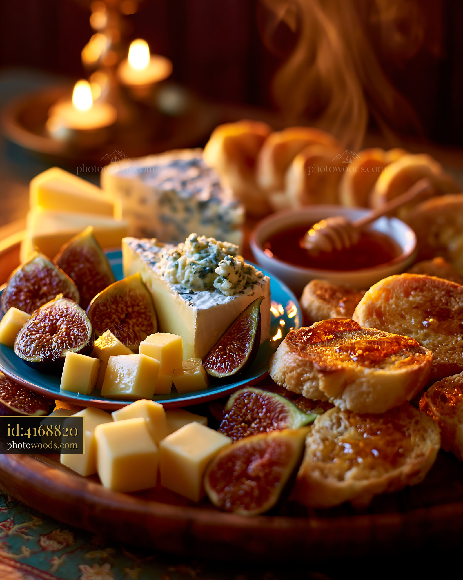 Charcuterie Board With Cheeses Figs Honey and Toasted Bread