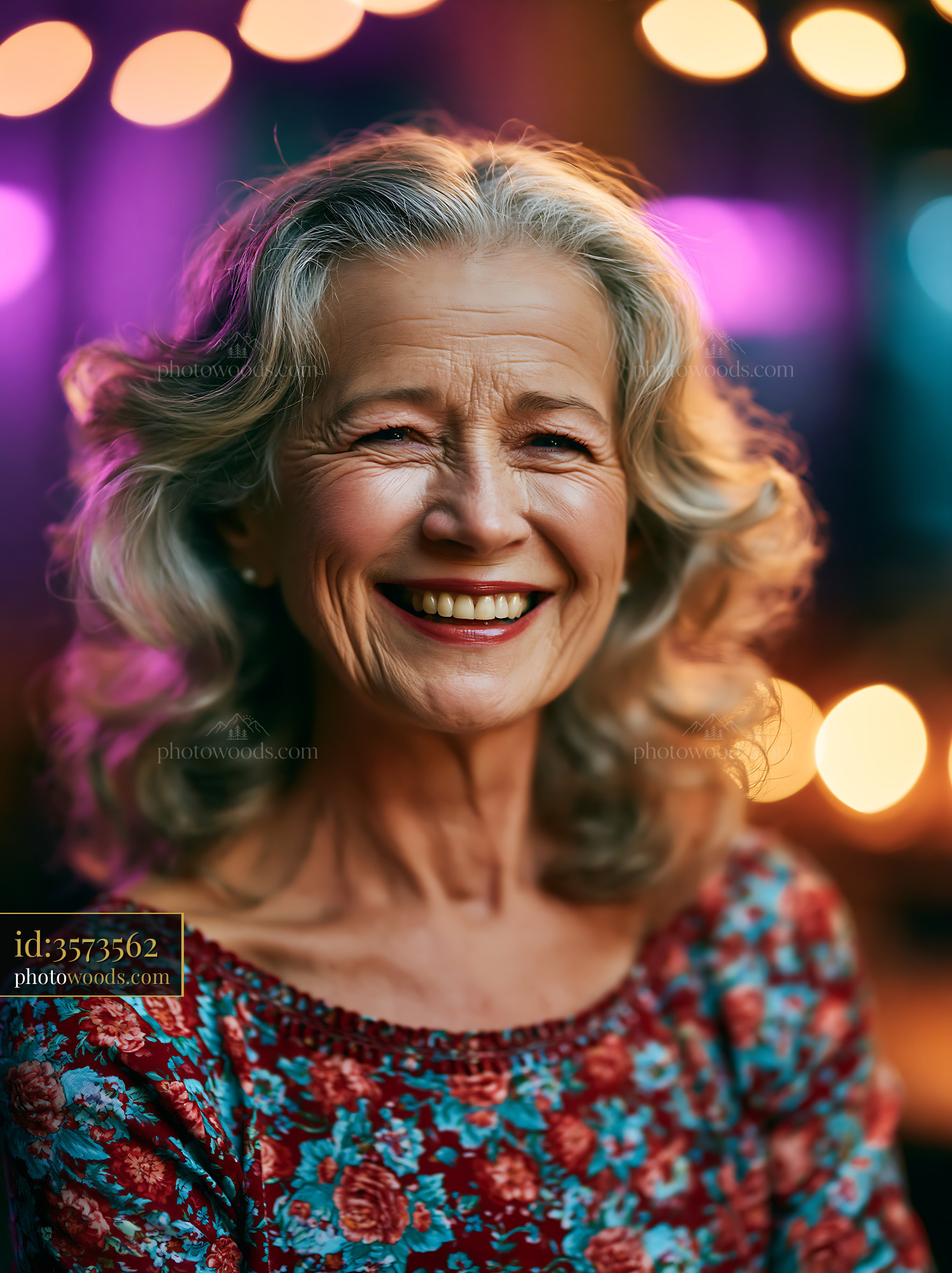 Smiling Woman With Curly Hair in Colorful Top at Evening Event
