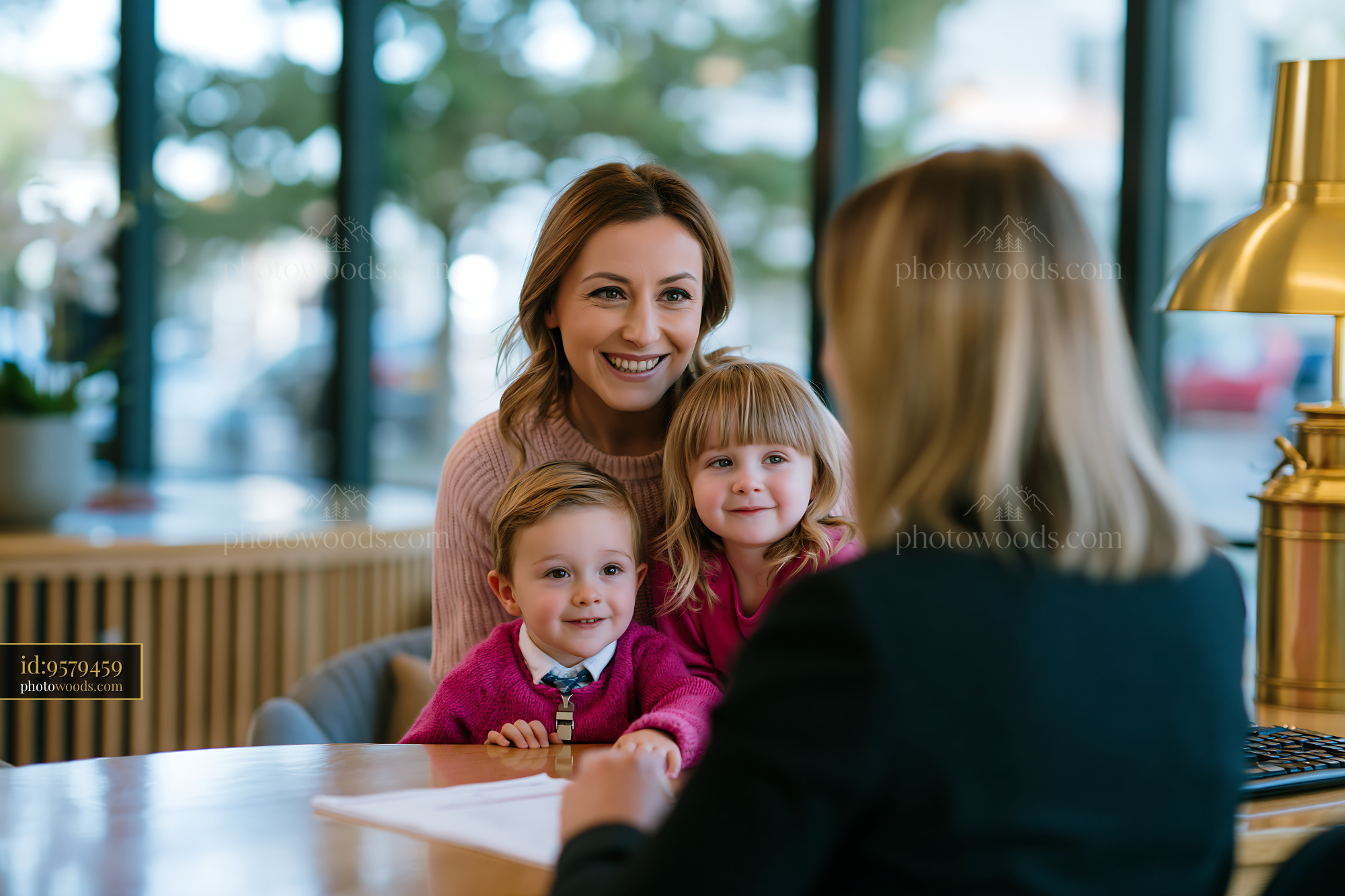 Family Discussing Insurance Offers at a Bank