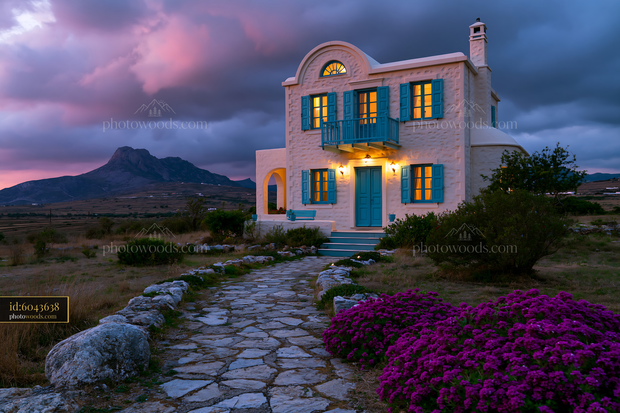 Greek Island Country House With Blue Accents at Sunset