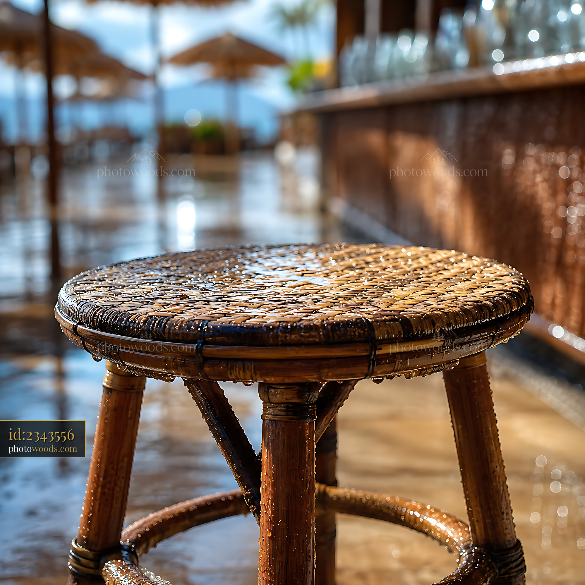 Wicker Stool on Wet Floor Beside Bar at Beach Resort