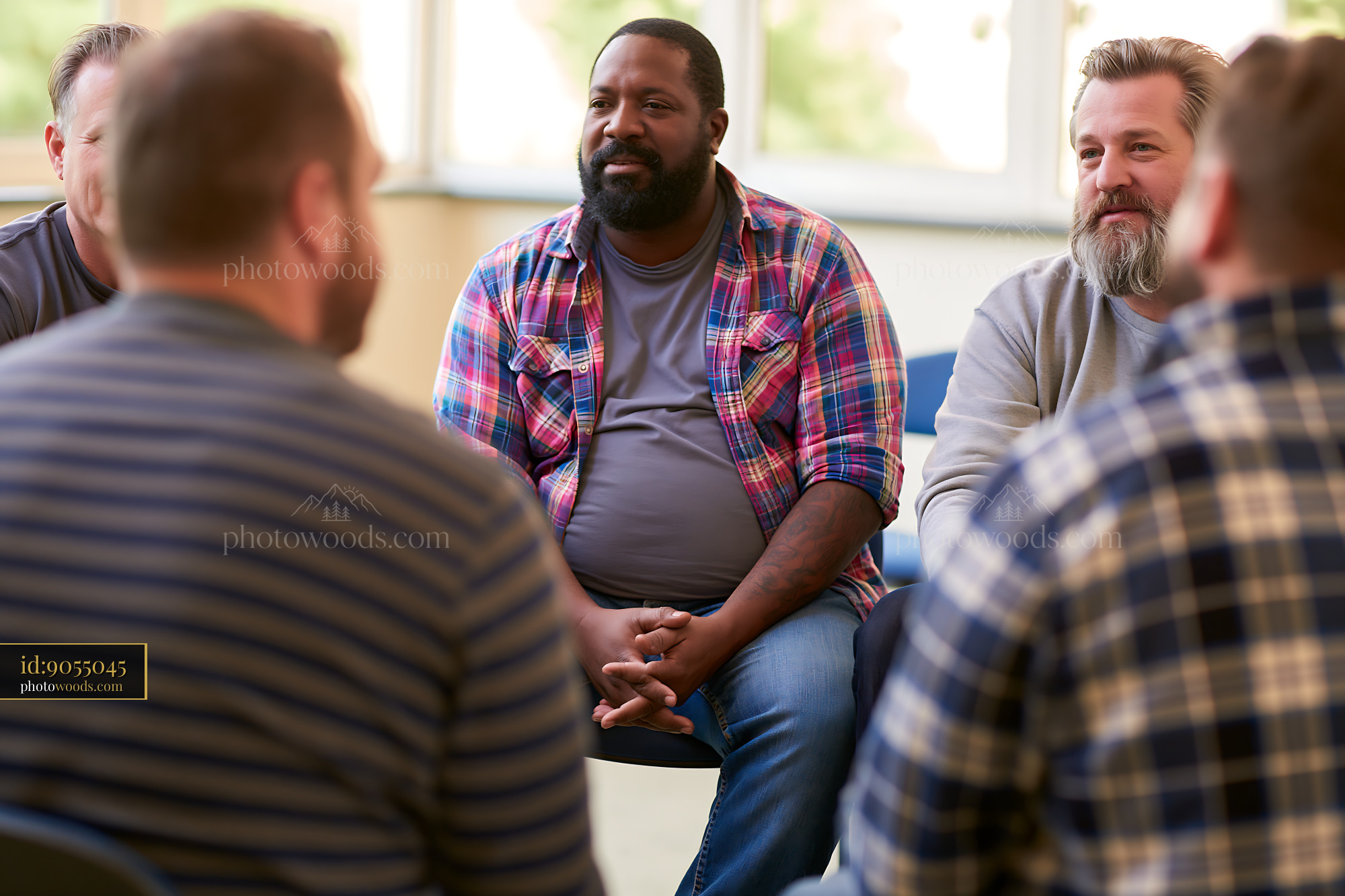 Men's Support Group Meeting in a Circle of Chairs