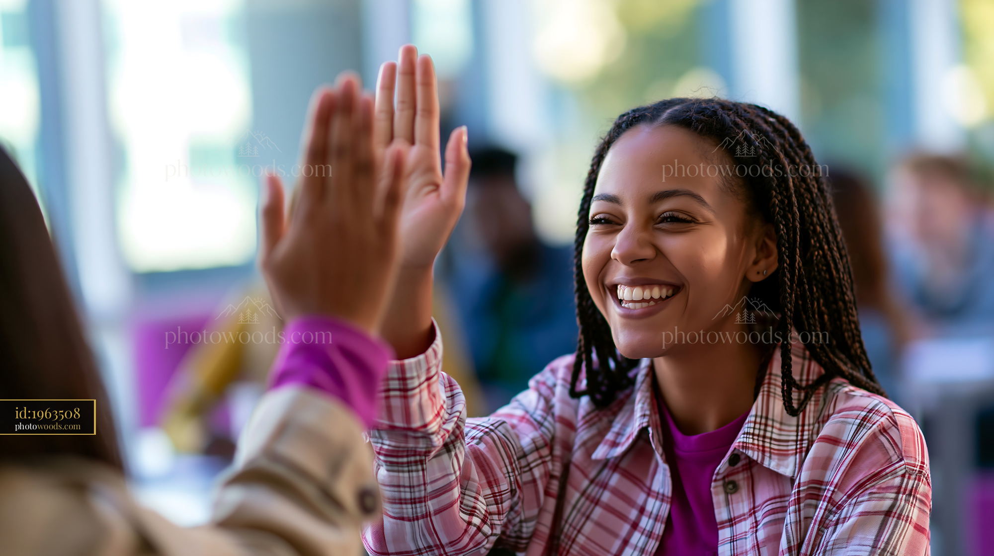 Laughing Student With Leg Braces High Fiving in Classroom Setting