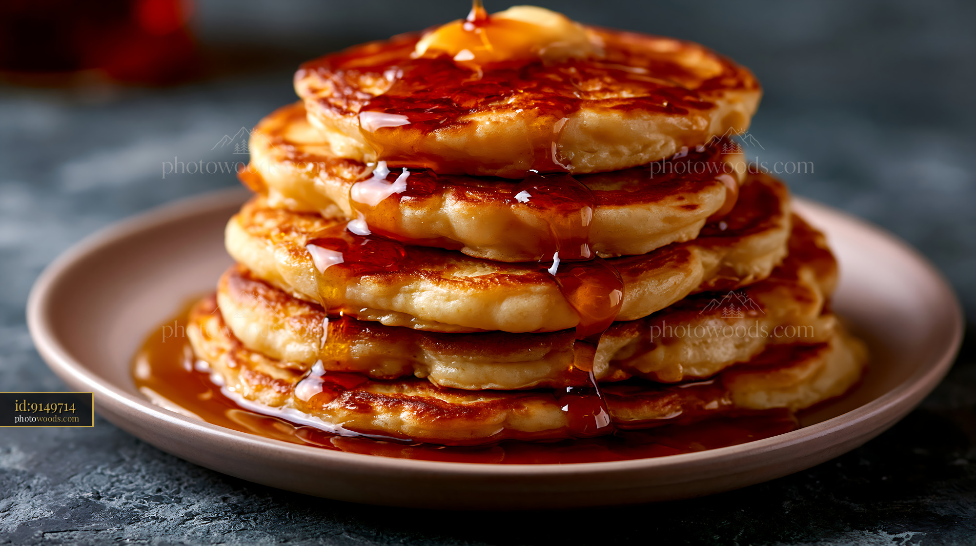 Fluffy Pancakes With Maple Syrup on a Plate
