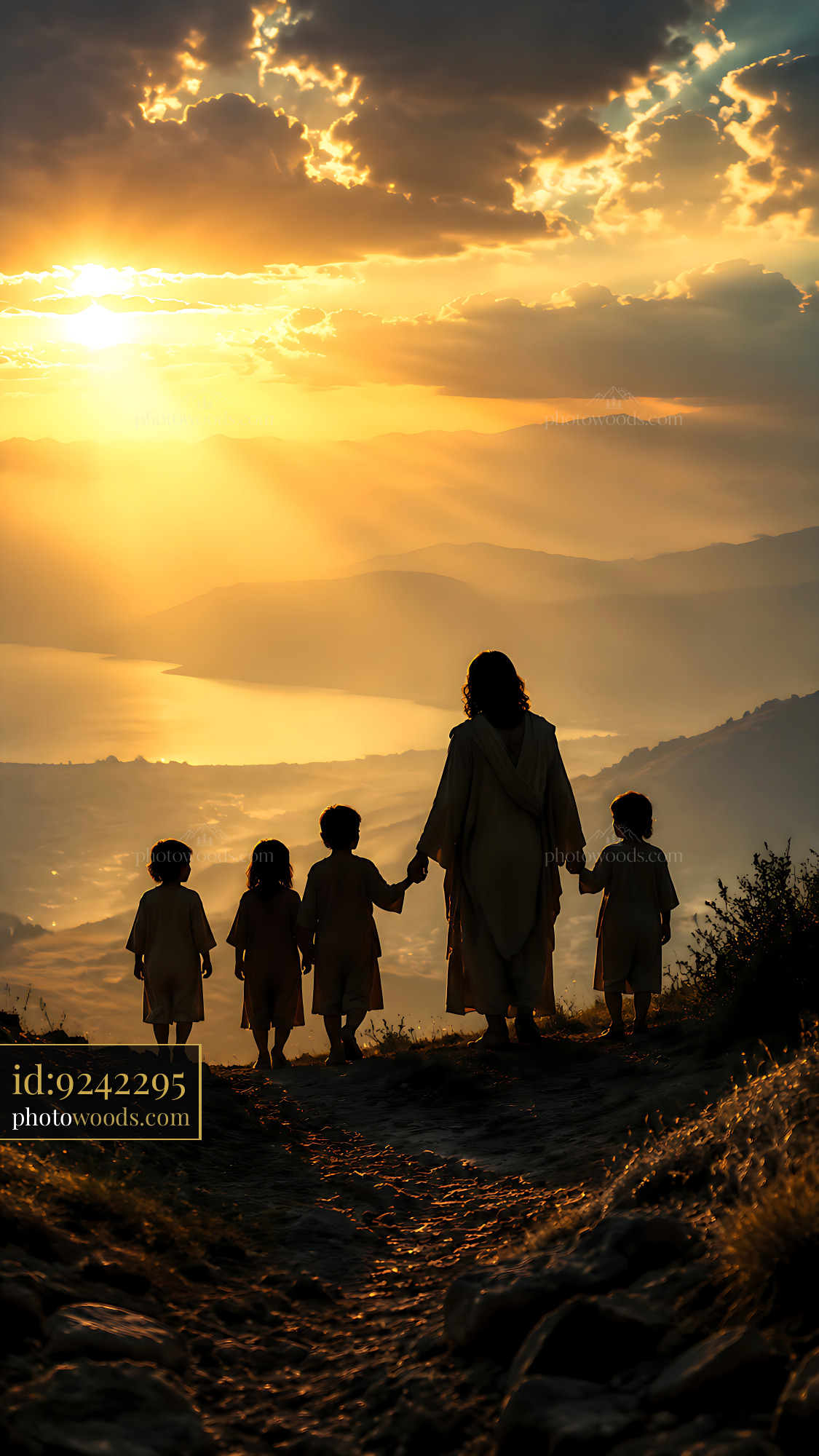 Children Walking With an Adult at Sunset by the Mountains