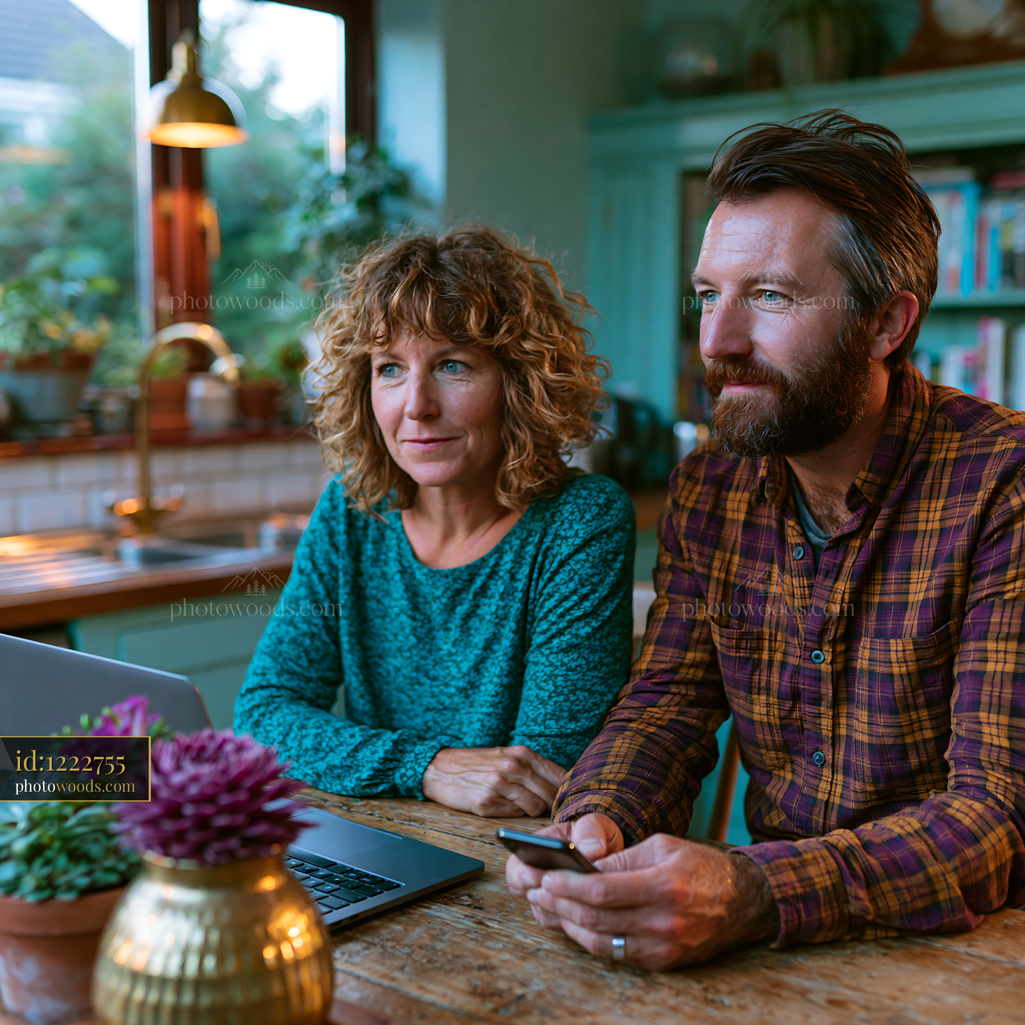 Co-parents Coordinating Their Schedule at a Kitchen Table