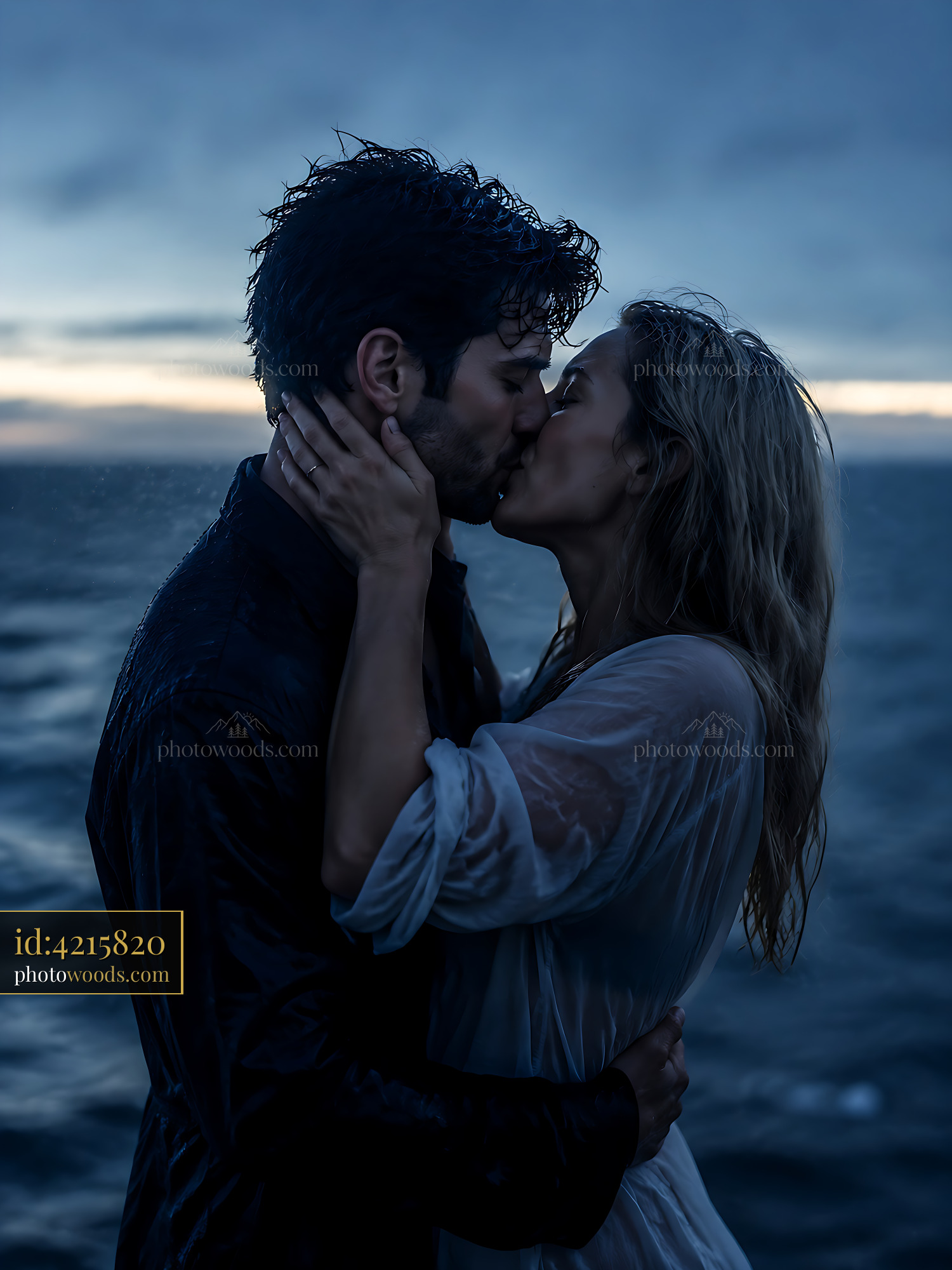 Couple Kisses Passionately by the Water Under a Dark Sky