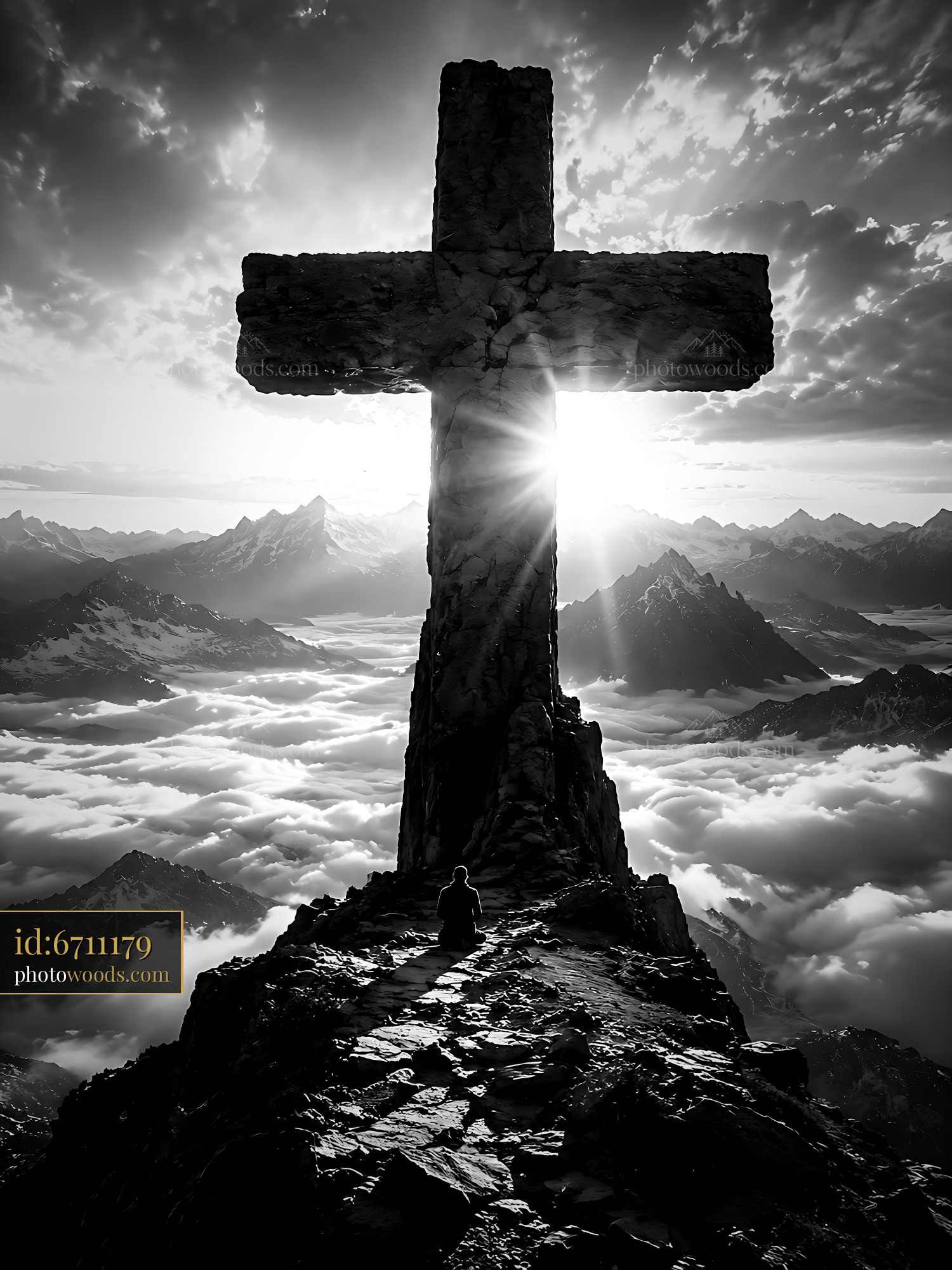 Cross Stands Tall Above Mountains With Person Sitting Nearby