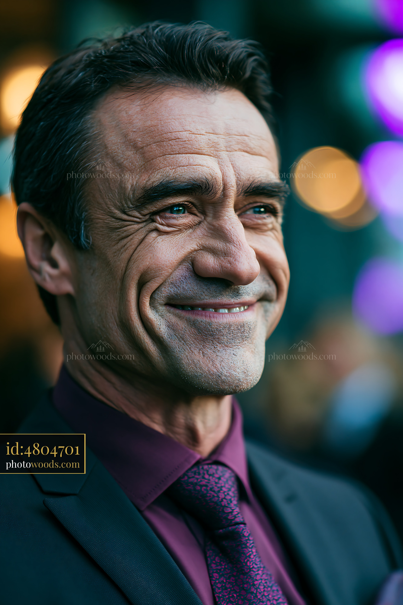 Confident Businessman Smiling in a Suit With Blurred Background