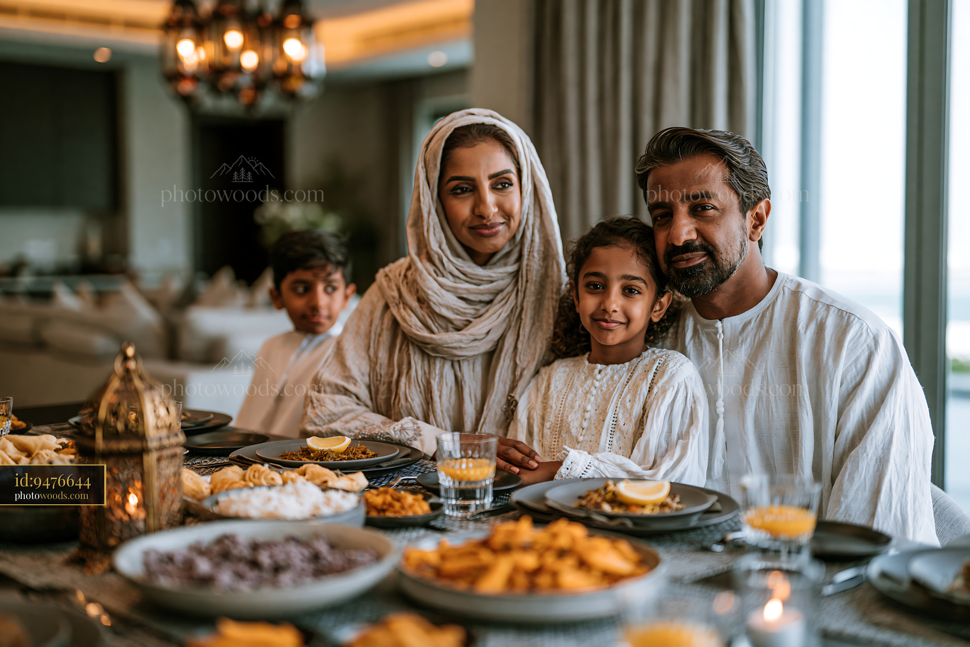 Family gathered around a festive dinner table at home