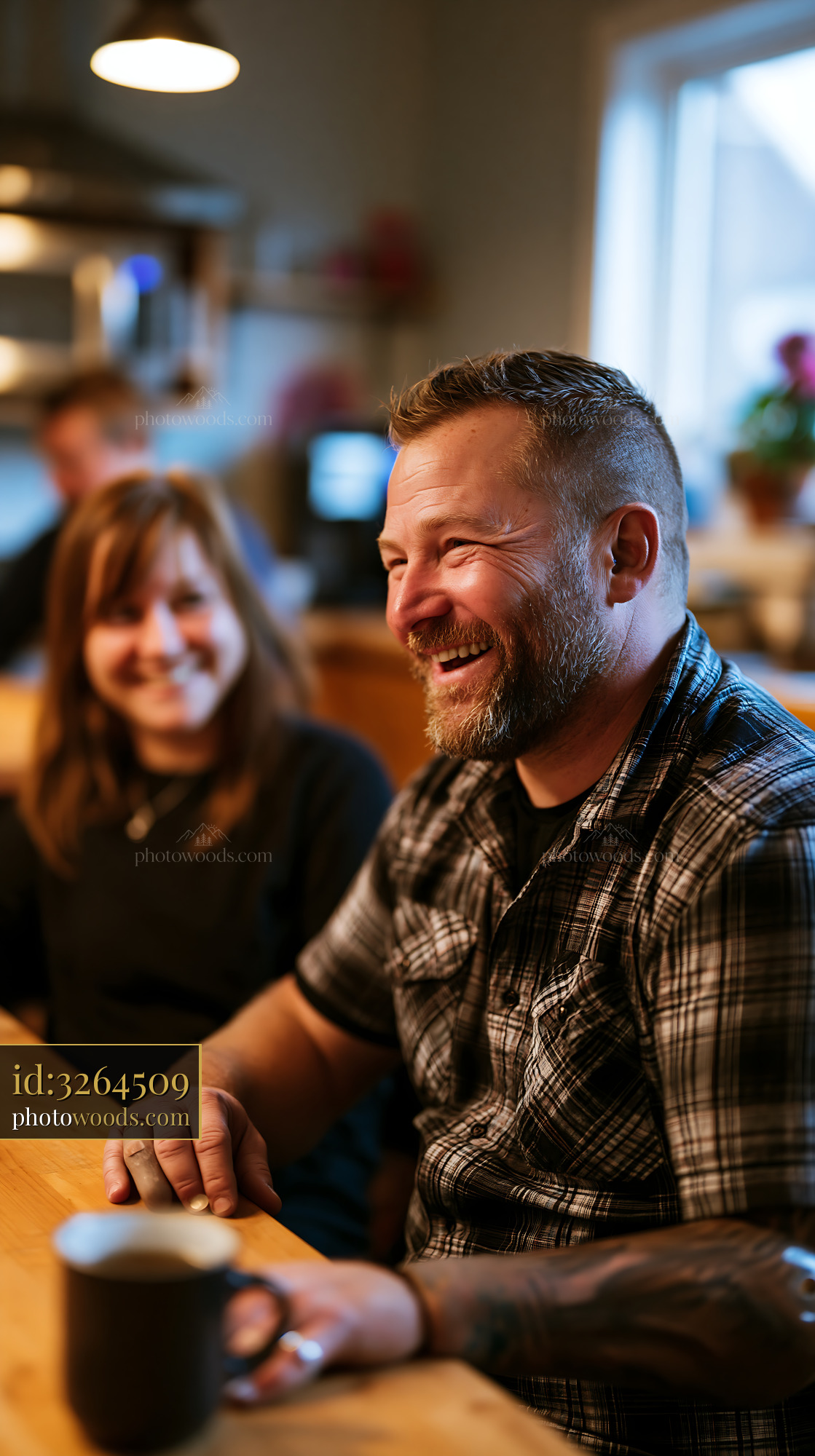 Joyful Craftsman With Prosthetic Hand Chatting With Friends