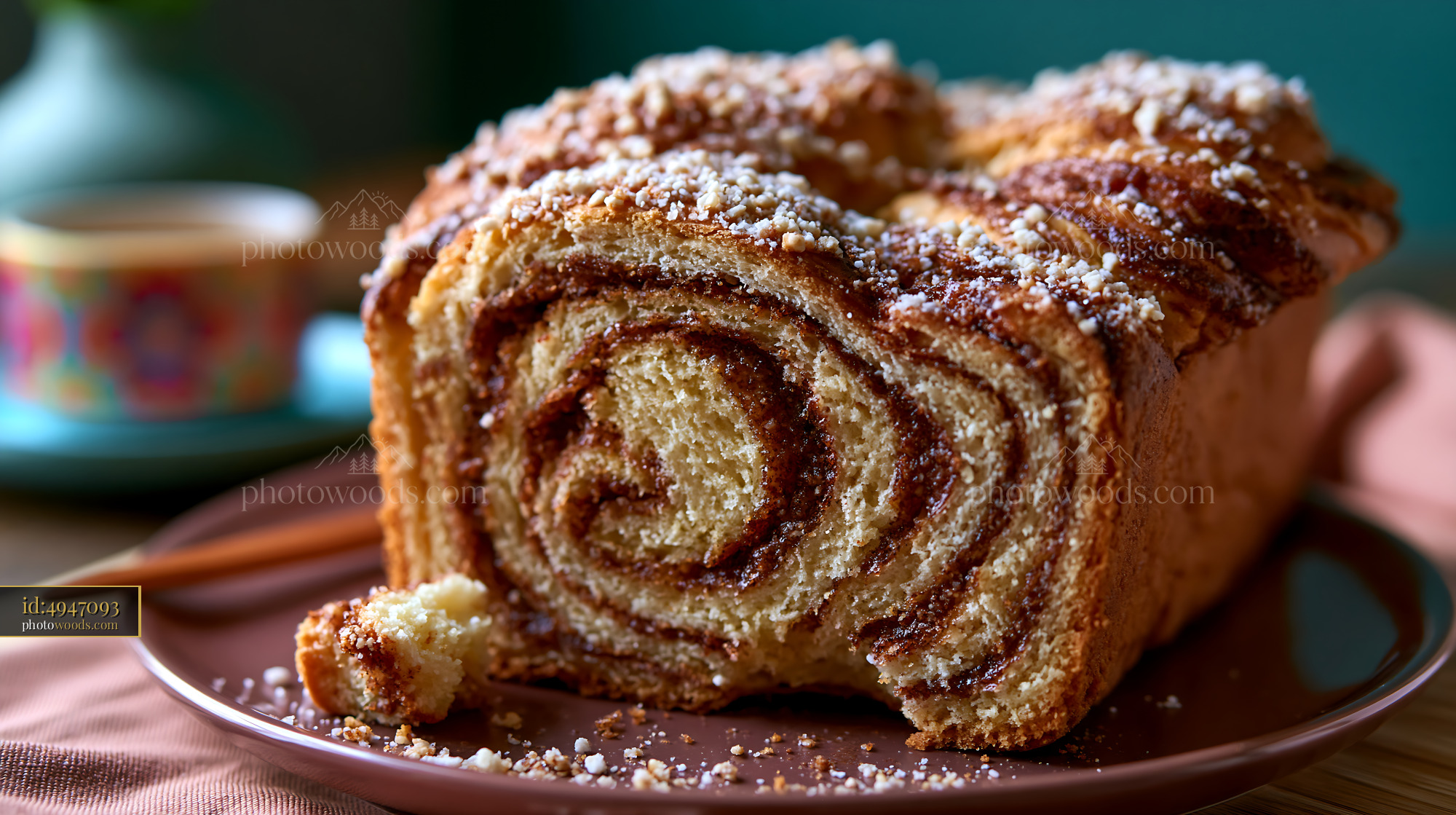 Cinnamon Babka Loaf With Swirled Layers on a Brown Plate