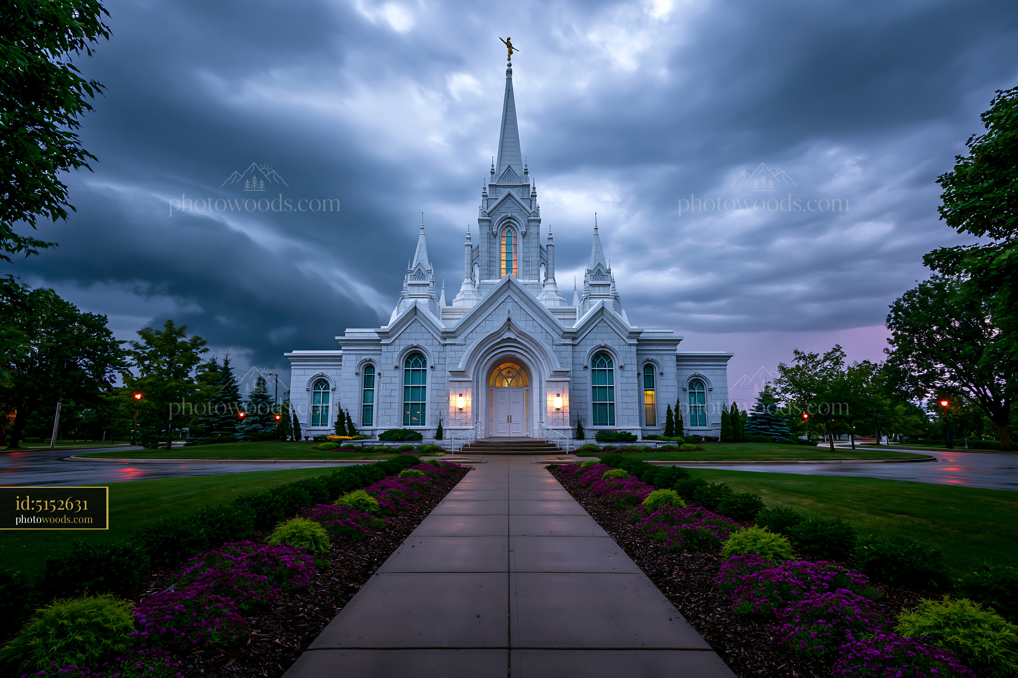 White Church Under Dark Stormy Sky in Spring