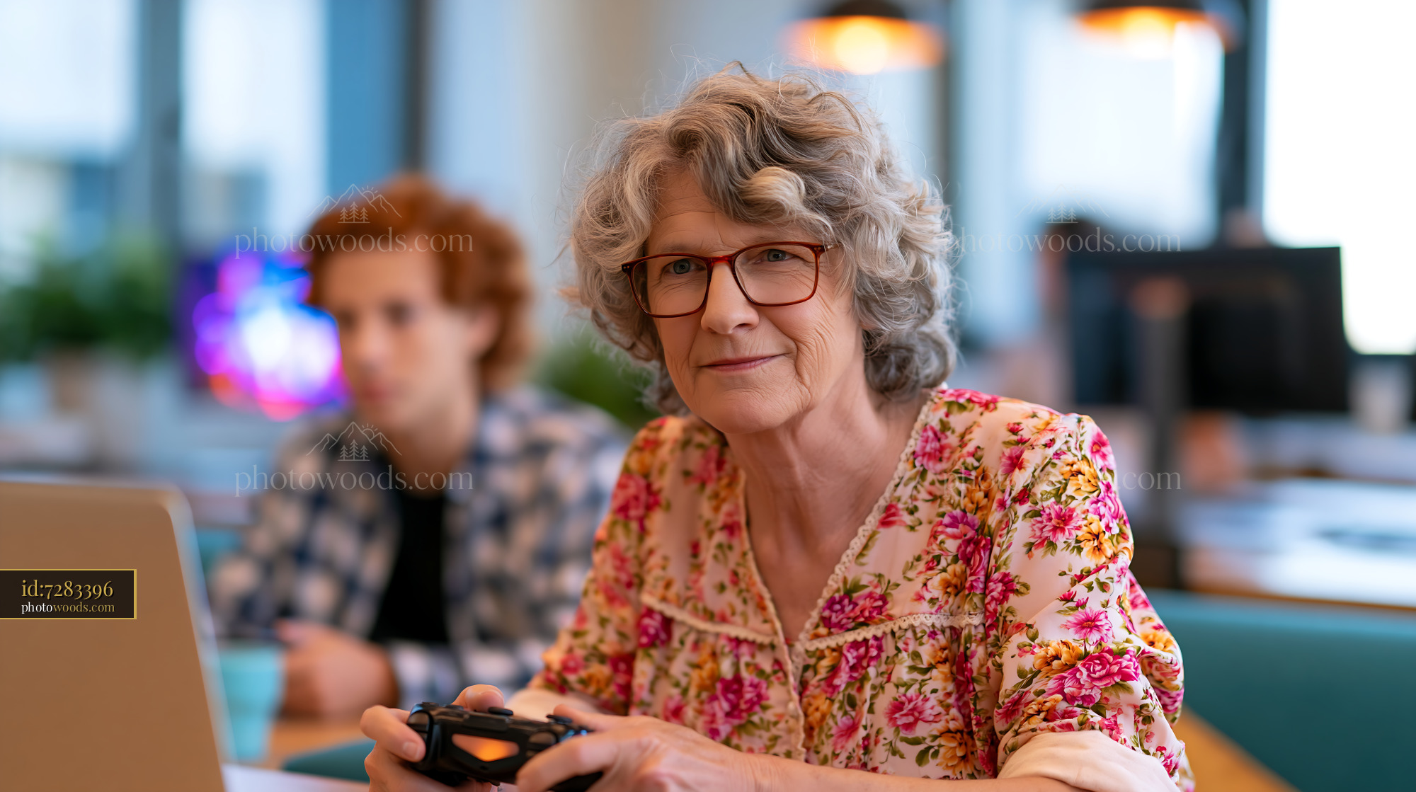 Older Woman Gaming With Her Grandson in a Modern Cafe