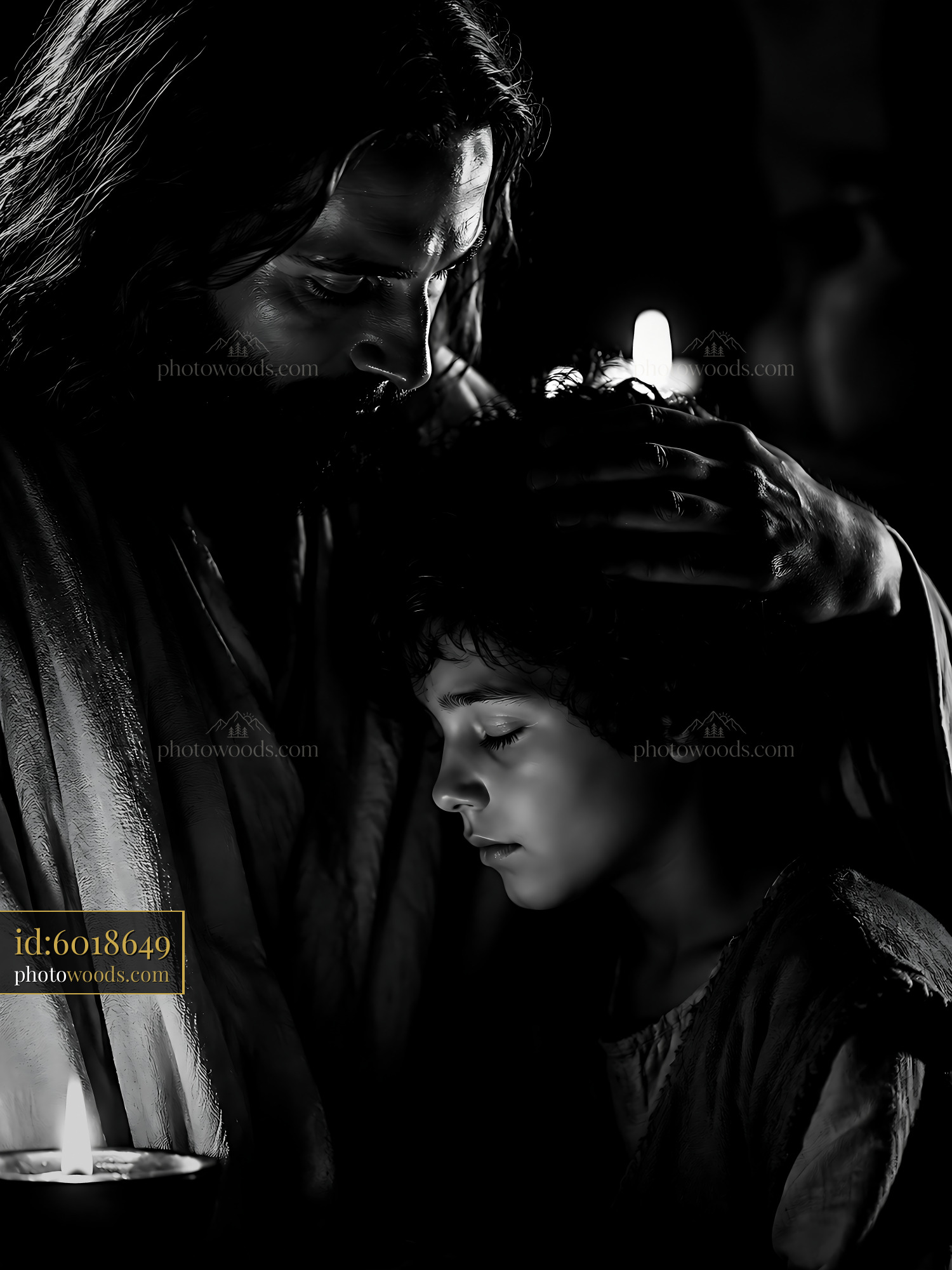 Father Holds Son Close in Soft Candlelight Moment