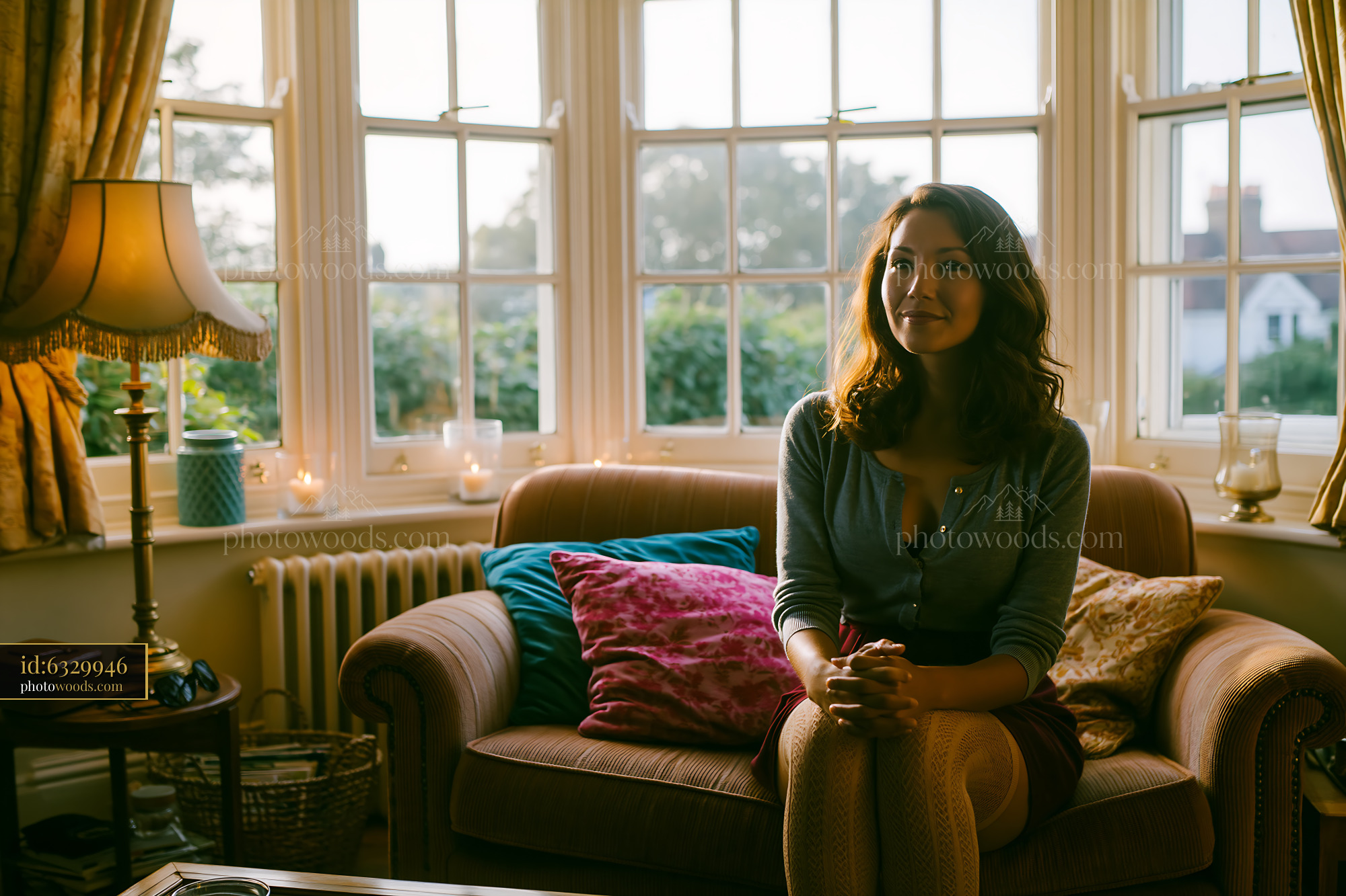 Office Worker Sitting in a Cozy Living Room, Talking in Soft Light