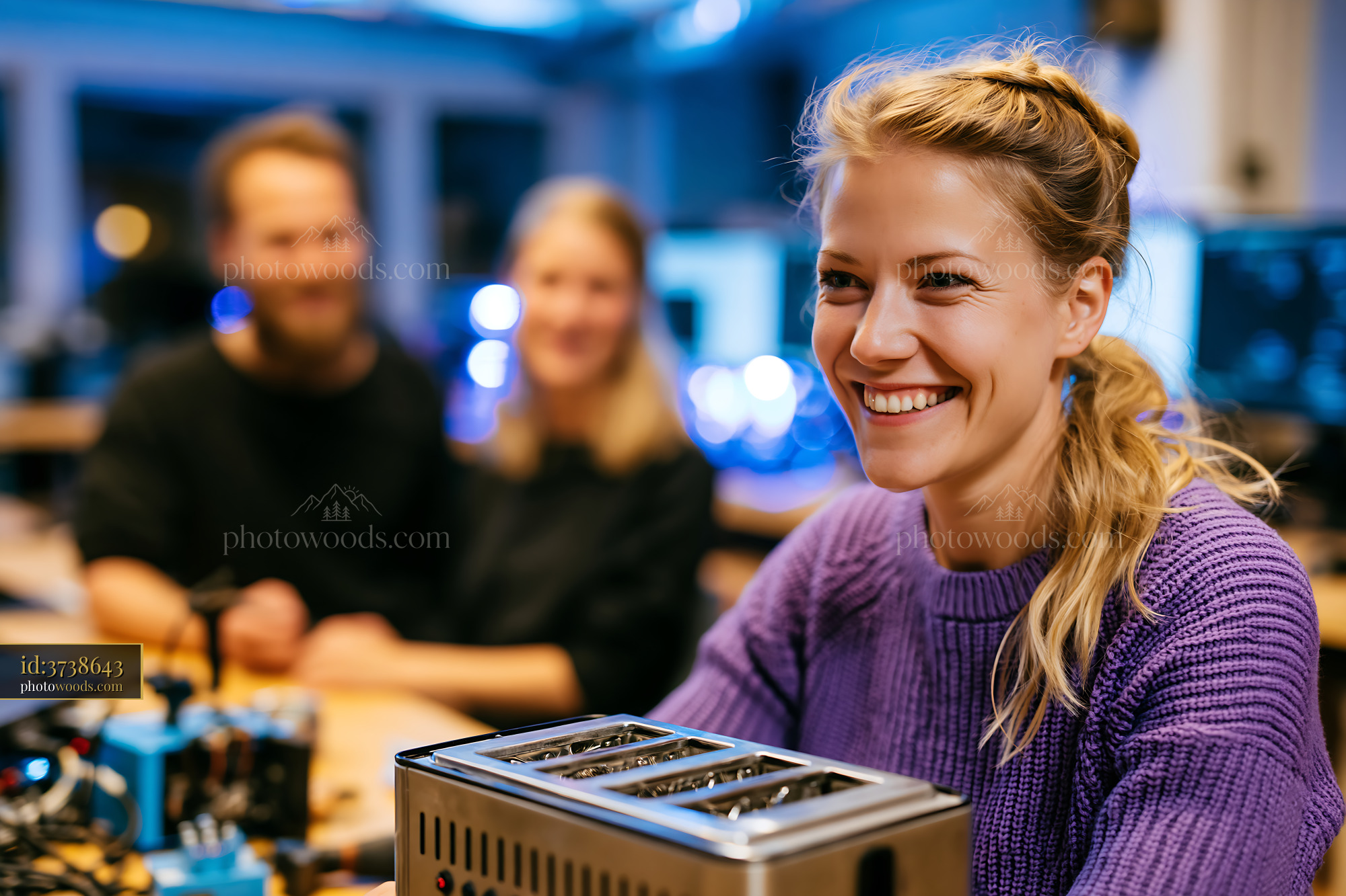 Sustainability Team Working on Electronic Repairs in Workshop