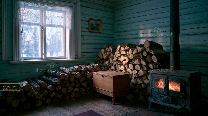 Wooden House Interior in Winter With Firewood and Stove